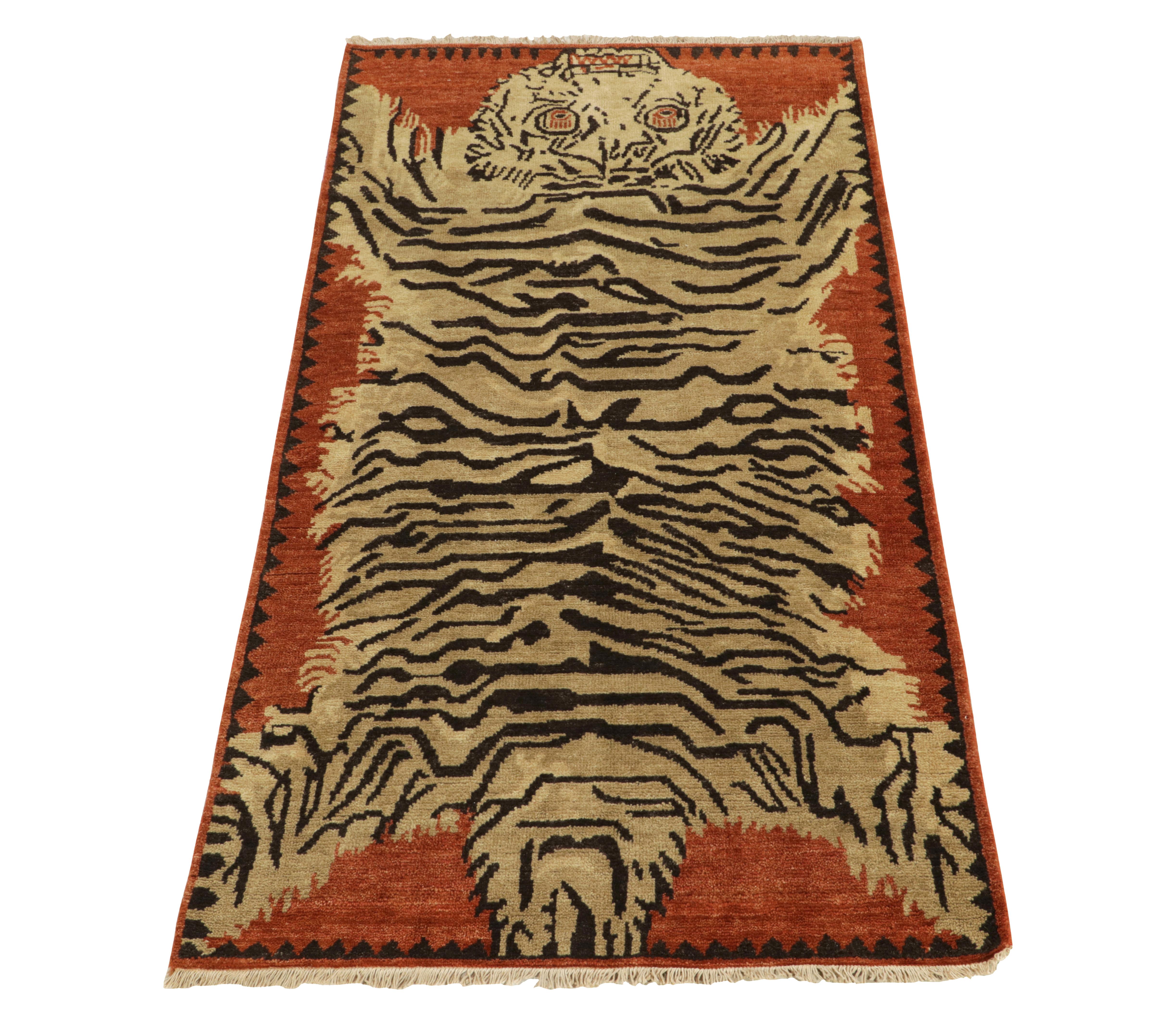 Hand-knotted in healthy wool pile, a 3x7 contemporary runner inspired by classic antique Indian tiger styles—from our Burano selections. The tiger rug pictorial in tones of beige-gold & black rests comfortably on a burnt orange background,