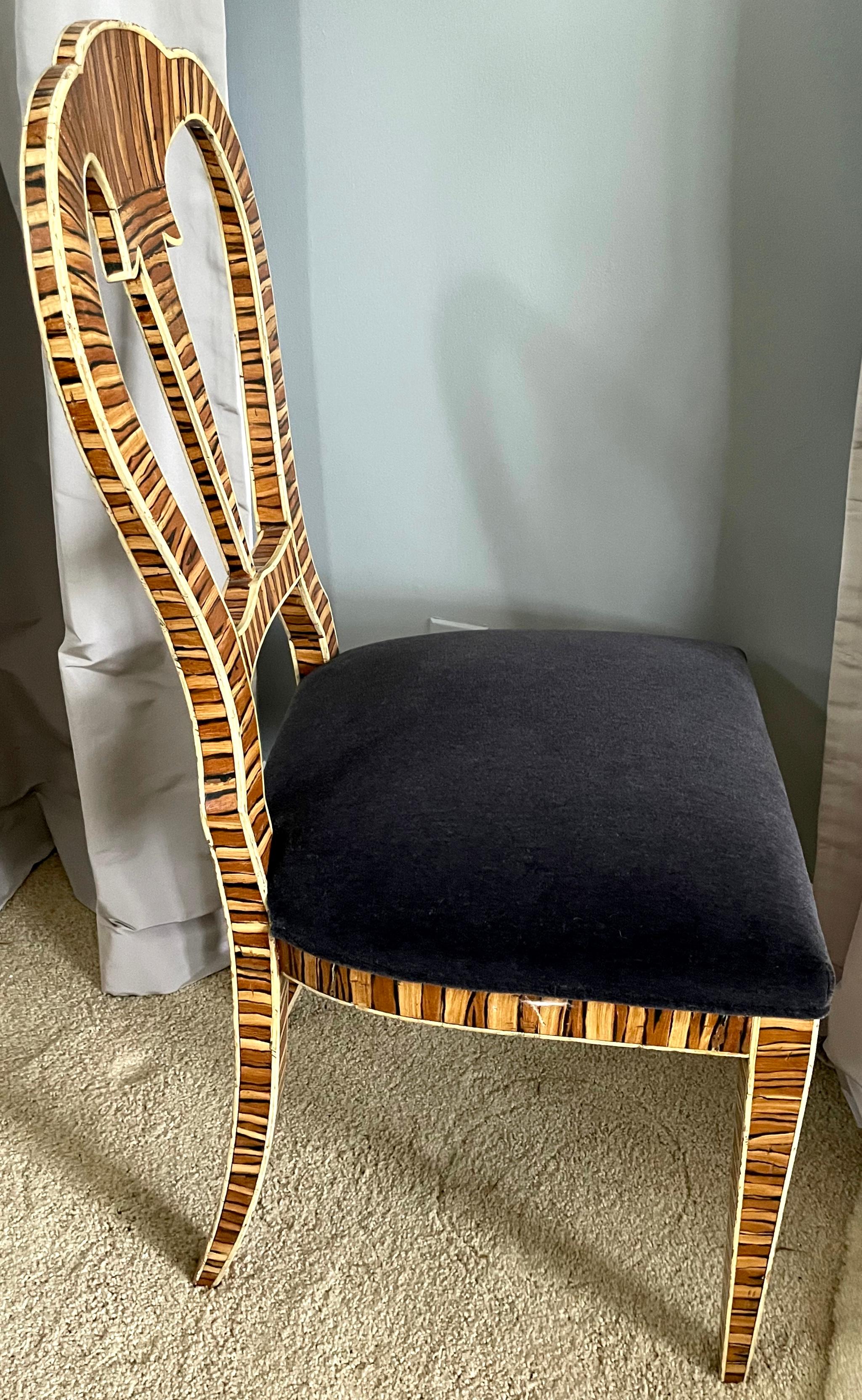 American faux painted tiger wood side chair with blue mohair. Faux painted zebra/ wood side chair with out splayed back legs newly reupholstered in steel blue Mohair
Dimensions:  19