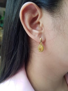 Tiger's Eye with Yellow Sapphire Earrings Set in 18 Karat Gold Settings