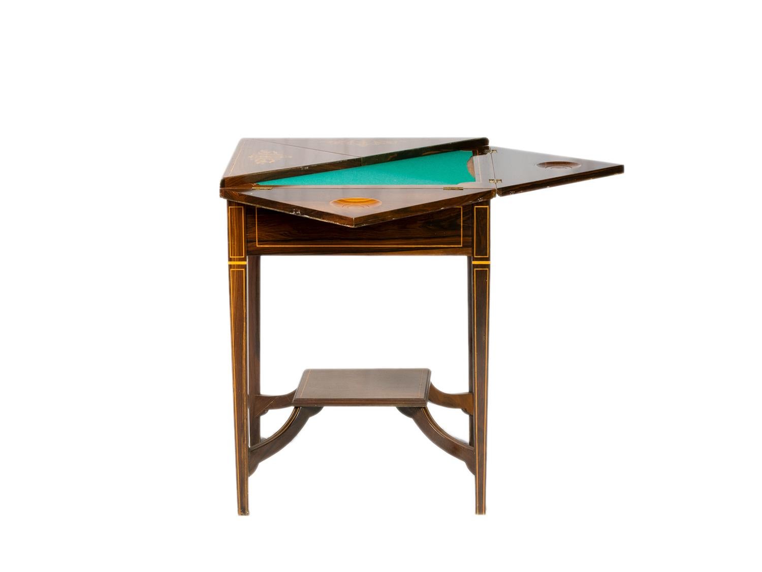 A handkerchief table in luxurious Gonçalo-alves wood (Tigerwood) with cards rests and drawer in the Victorian style.

Envelope cards and game table 