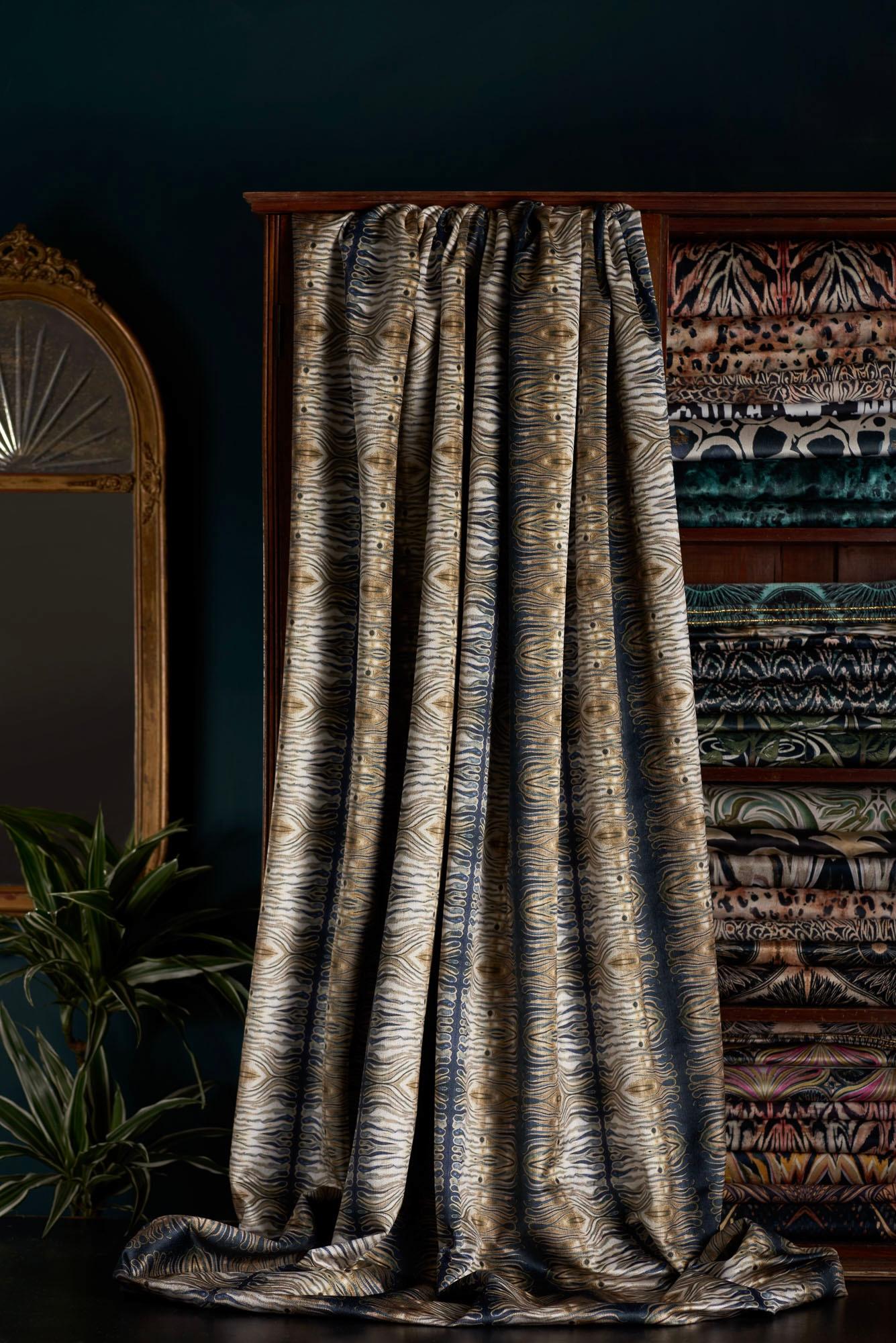 An animalesque design came from painting in gold, black, and teal strokes, dreamily and laid down using inks and liquid gold.

This velvet is midweight, with a strong straight woven backing, so is suitable for upholstery, but is also light enough