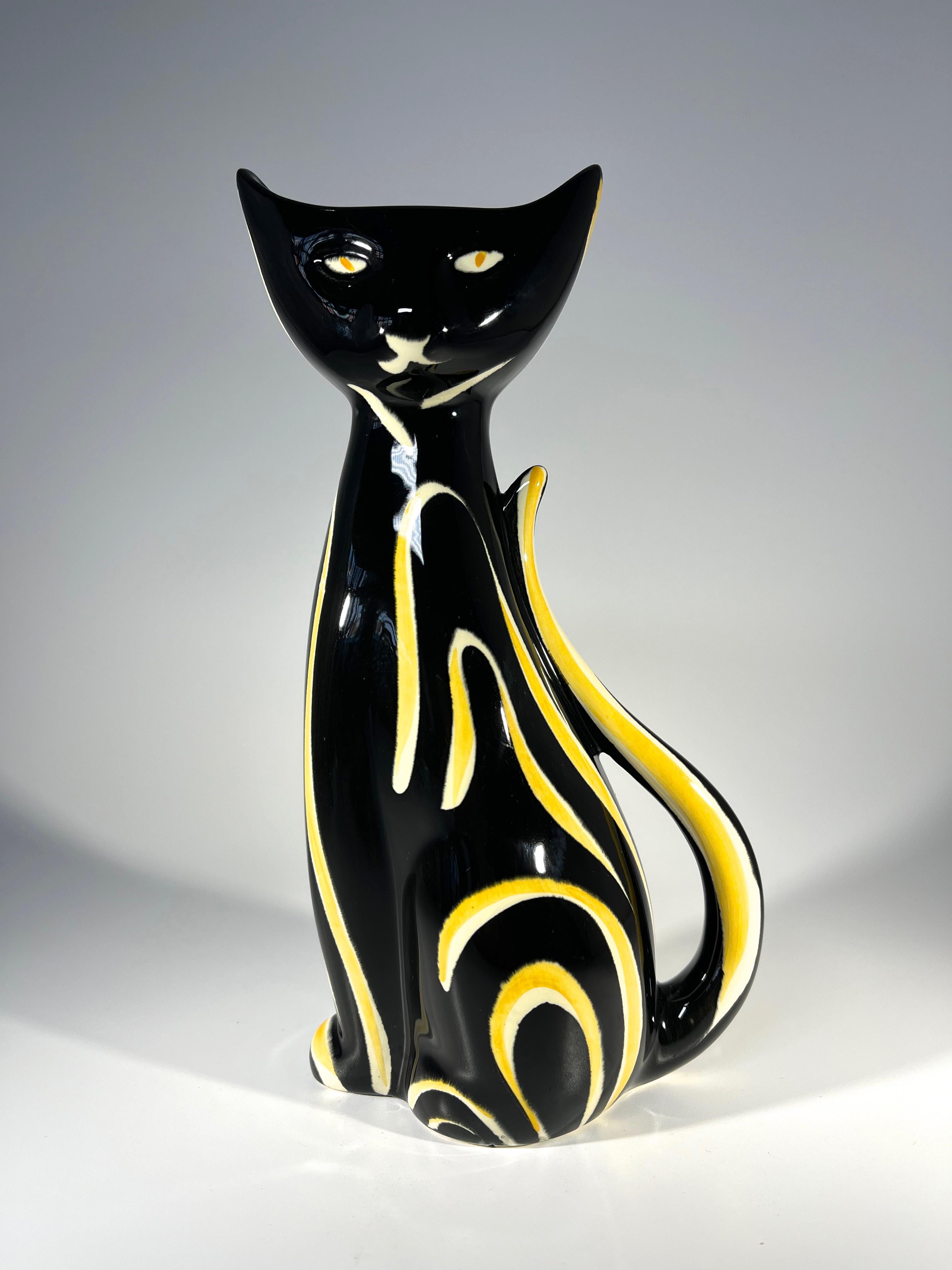 Striking black and yellow Tigris cat vase designed by Anneleise Beckh for West German company Schmider Keramik
Inscrutable expression on this strong design piece of retro
Circa 1950's
Numbered 4310 to base
Height 8.5 inch, Width 4 inch, Depth 2.75