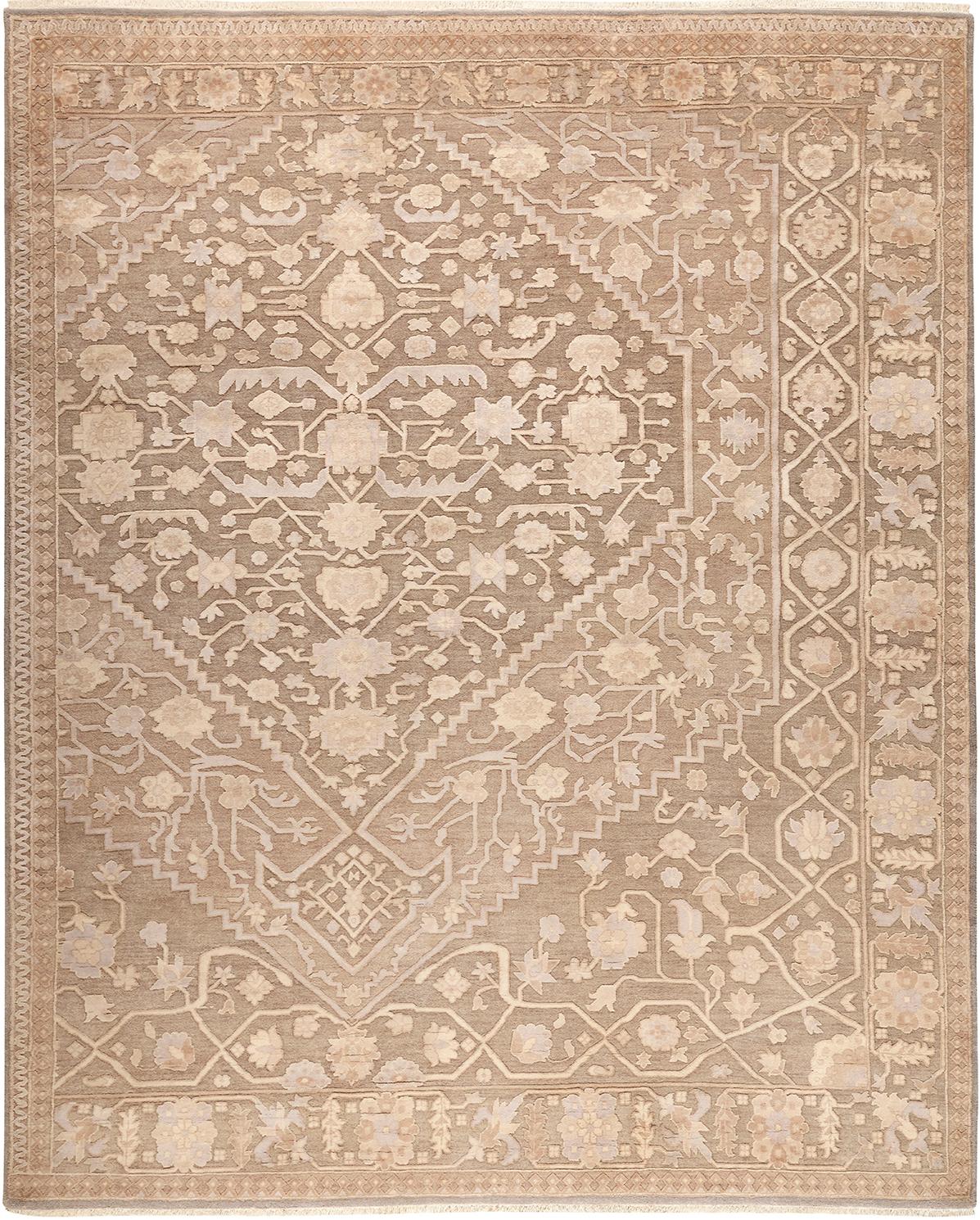 This antique Persian Bidjar is one of the rarest and most artistic rugs and features a distinct eye-catching design. The tribal geometric layout features a bold border, rich with floral designs as well as whimsical geometric figures of avian life