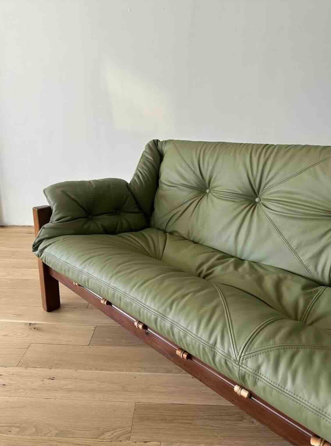 Designed by Jean Gillion for Italma of Brazil in the 1970s, this 'Tijuca'' sofa features a thick leather cushion supported by an intricately woven string hammock on a solid Brazilian Rosewood Frame. This set is extra special due the upholstery,