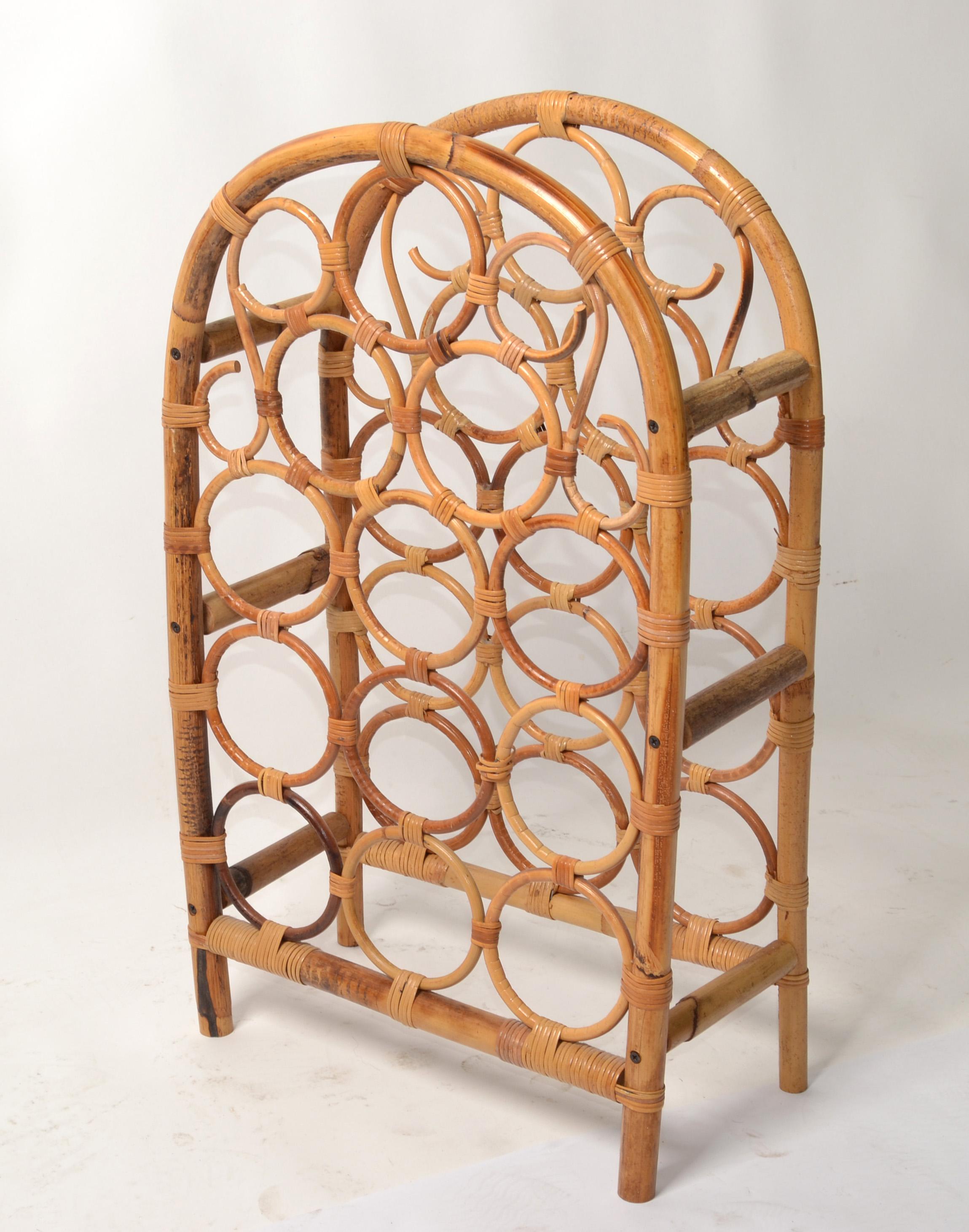 Vintage Tiki bar Arched burnt bamboo, cane and rattan twelve bottle wine rack, wine storage, wine basket.
The basket is firmly woven with beautiful circle Bamboo. 
It is made to hold 12 bottles.
Great Barware for a Tropical Bohemian Party Room.