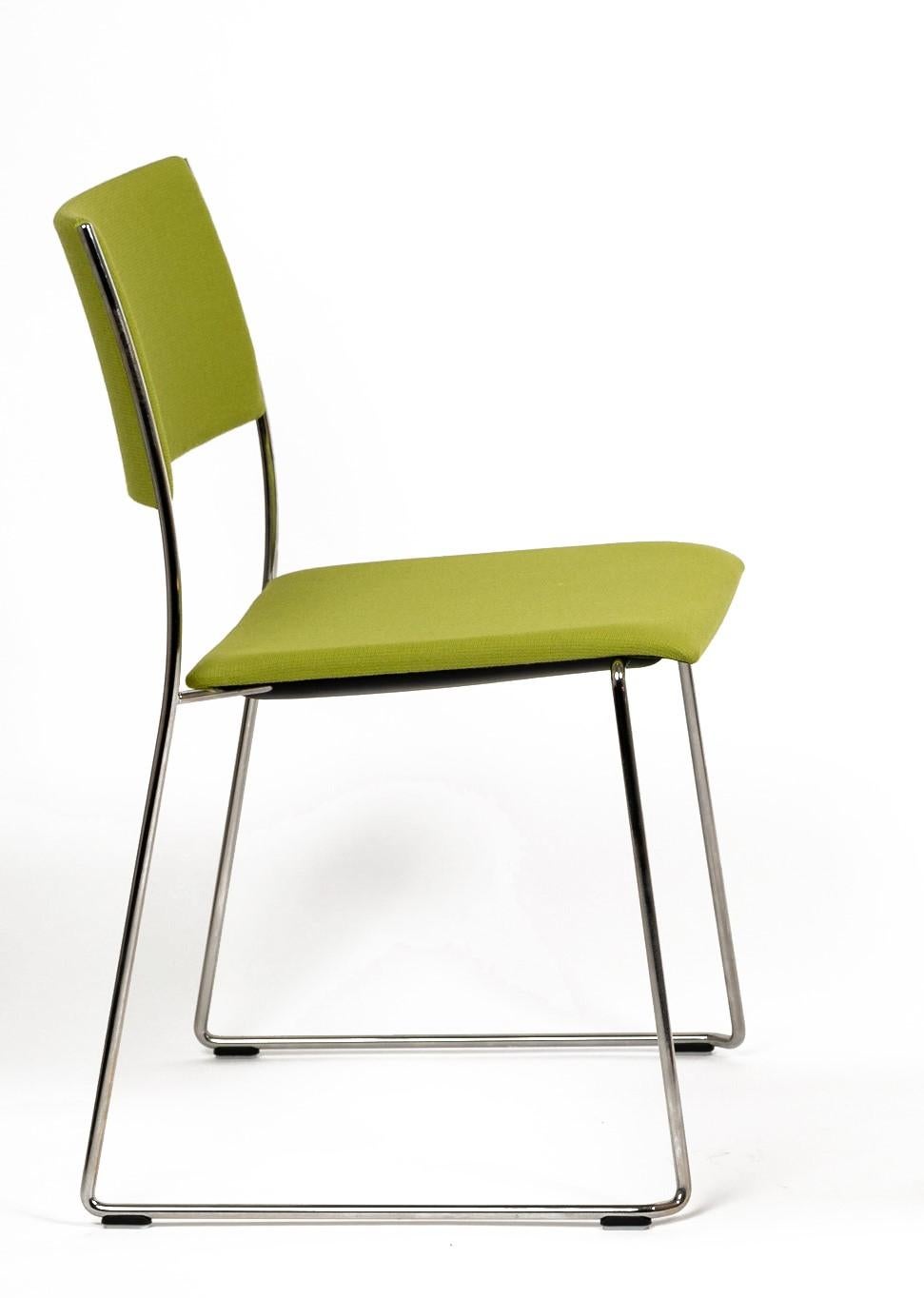 The ultra-slim Tila is a clever, filigree, and innovative multipurpose stackable chair, with a sled frame and outstanding stackability up to 30 chairs. It is an optimal solution for interior flexibility.

- Upholstered back in seat
- Contract