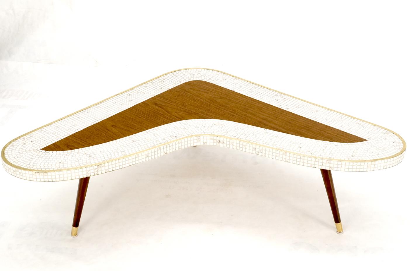 Mid-Century Modern tile inlay L shape coffee table on cone shape walnut legs with brass tips. Perfect coffee table to go with any L shape sofa.