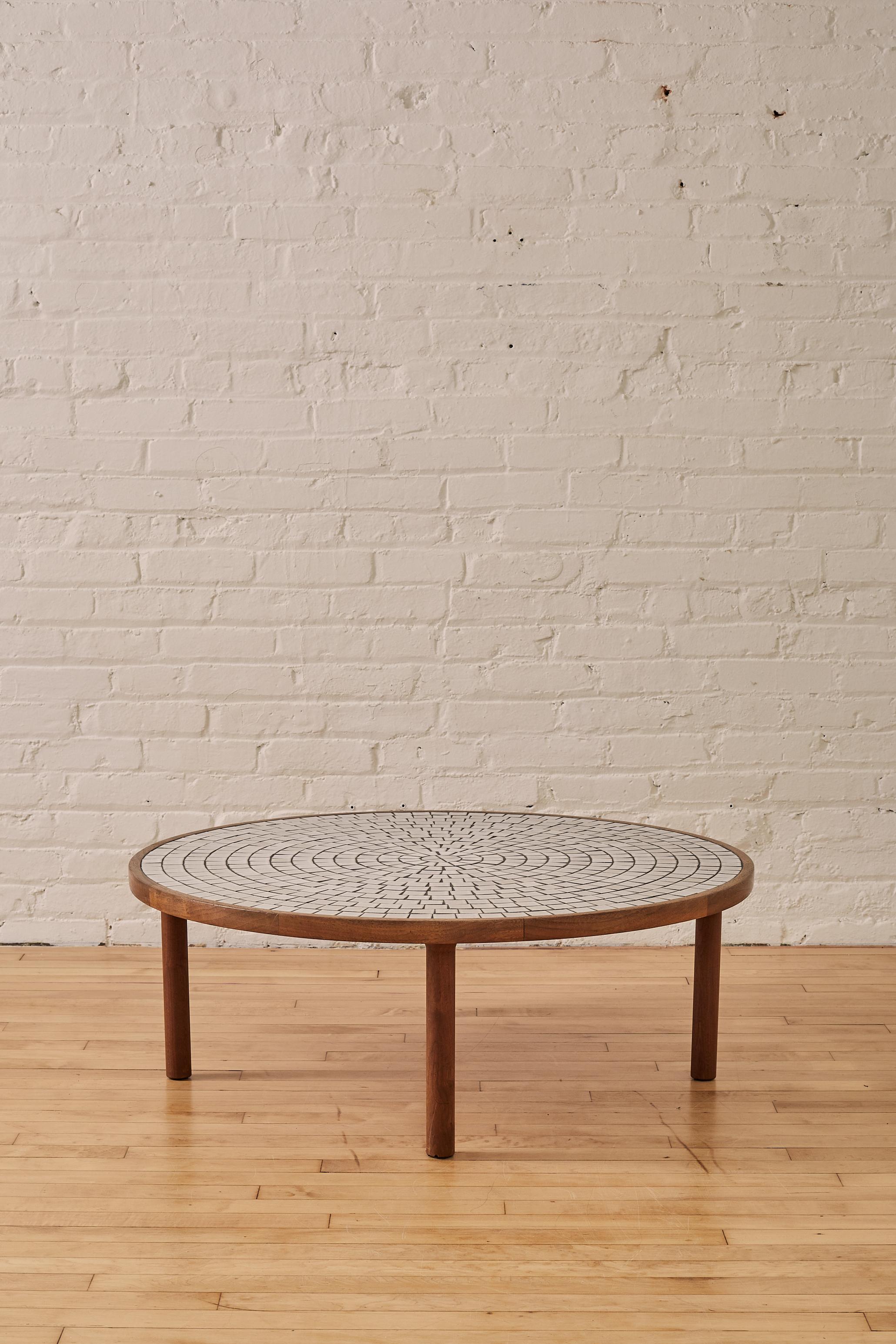 Tile Top Coffee Table by Jane & Gordon Martz on Teak legs

About Jane and Gordon Martz:

Gordon (1924 - 2015)  and Jane Martz (1929 - 2007) both studied at the New York State College of Ceramics at Alfred University and also met there. After