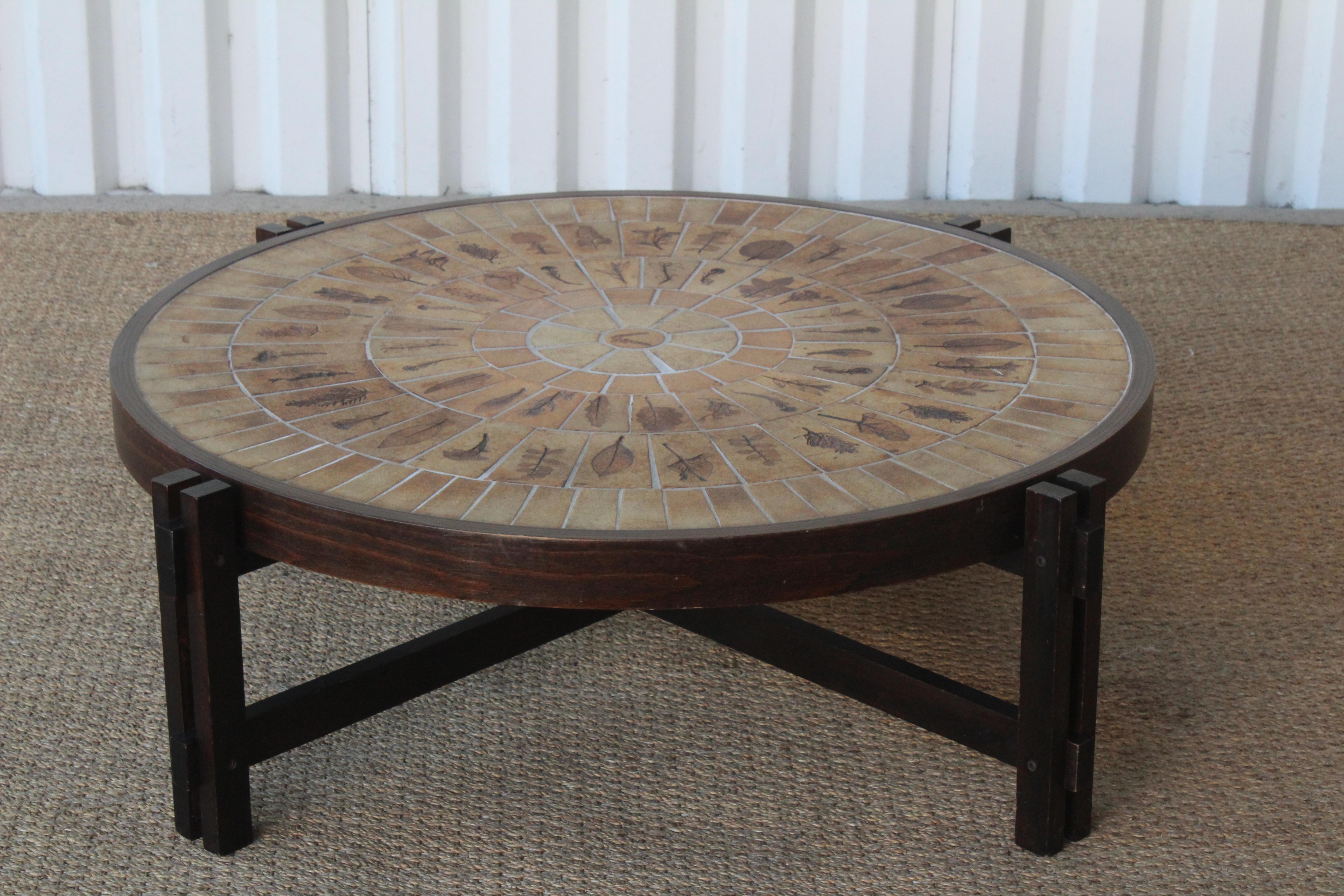 Vintage tile topped coffee table on wooden base by Roger Capron, France, 1960s. In over all good condition, wood base shows minor signs of wear.