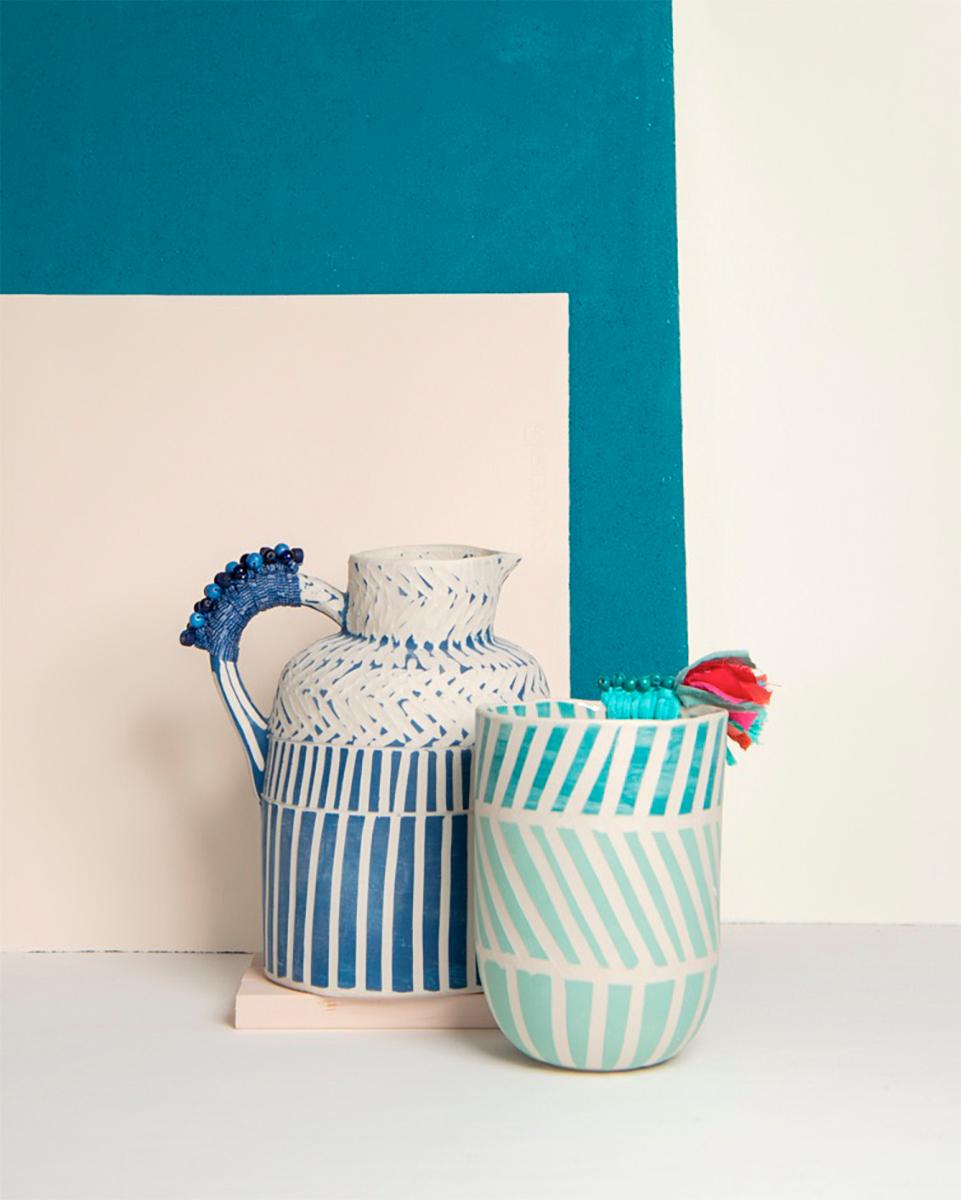 blue and white striped milk jug