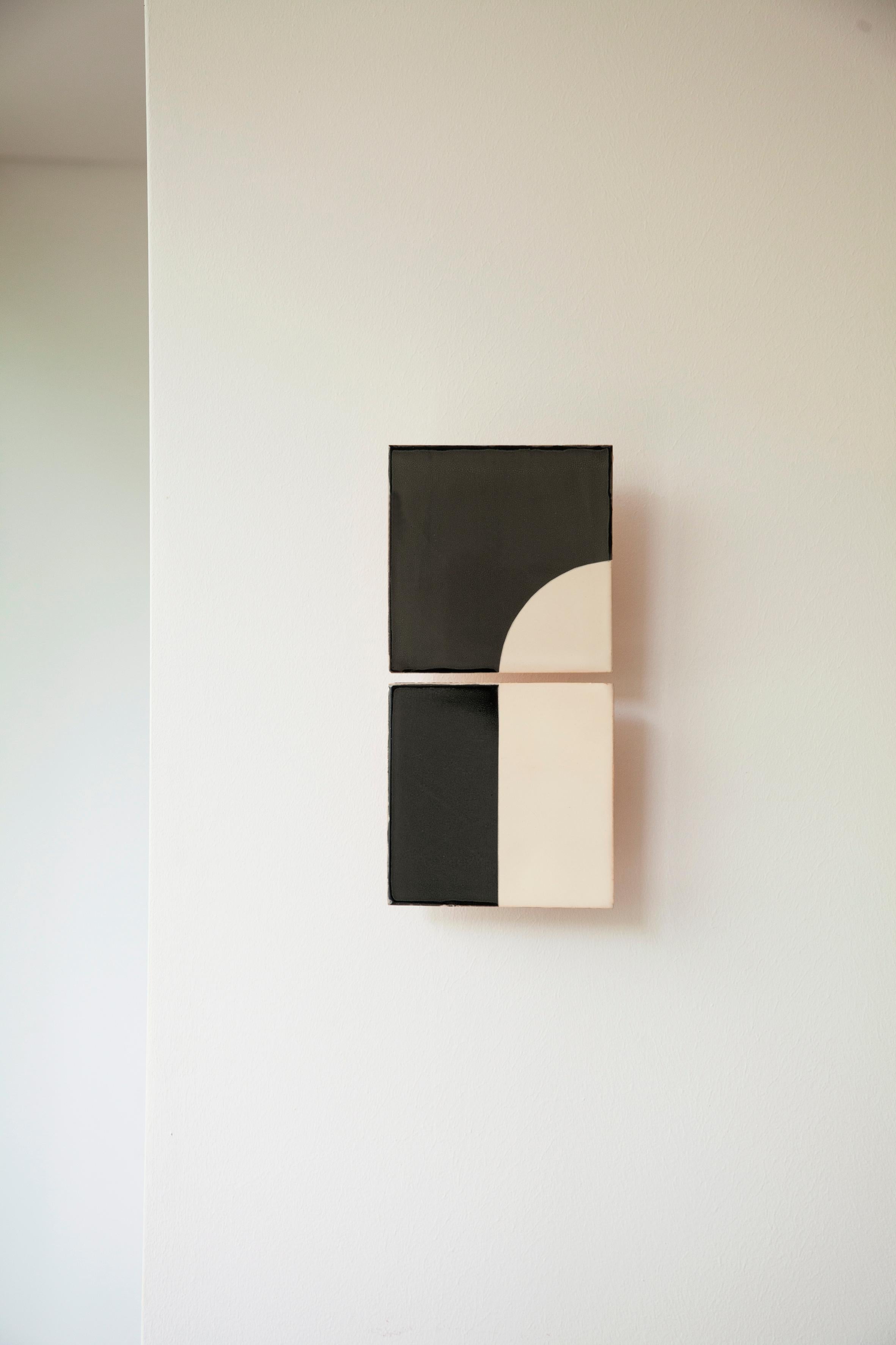 Tiles Door Black Ceramic Decorative Wall Lamp by Violaine d'Harcourt
Dimensions: D 5,4 x W 14 x H 29 cm.
Materials: Ceramic.

Wall light made in Portugal in collaboration with Dutch designer Marianne Smink, Bulb included: LED 9W. Available in