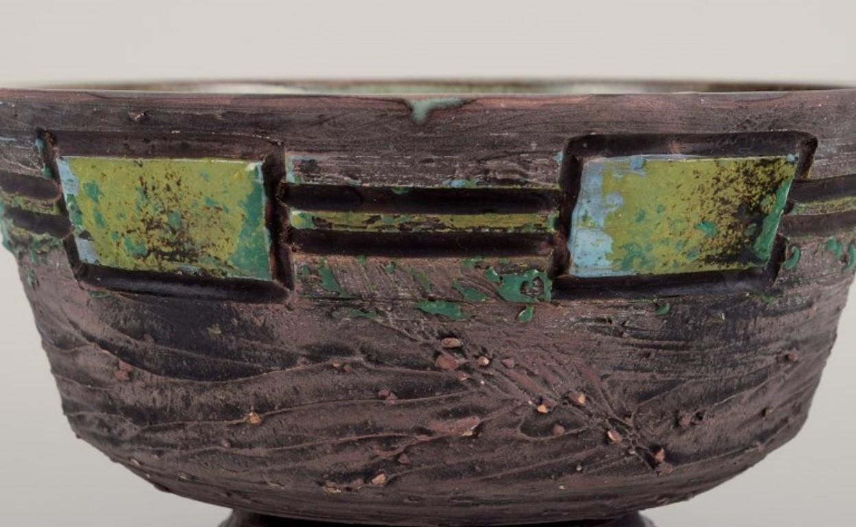 Tilgmans Keramik. Ceramic bowl on a foot. Glaze in green tones. In Excellent Condition For Sale In Copenhagen, DK