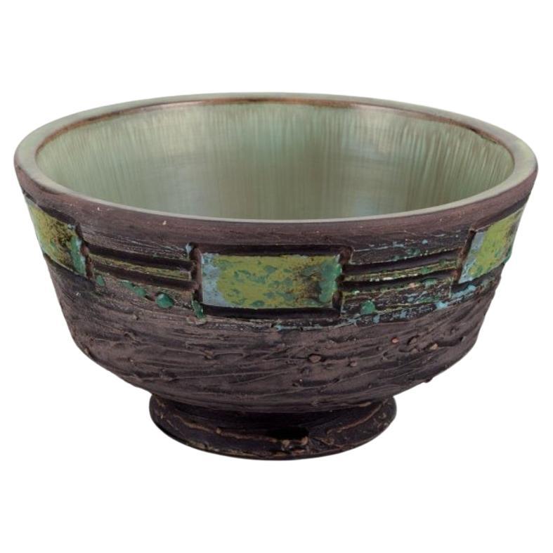 Tilgmans Keramik. Ceramic bowl on a foot. Glaze in green tones. For Sale