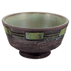 Vintage Tilgmans Keramik. Ceramic bowl on a foot. Glaze in green tones.