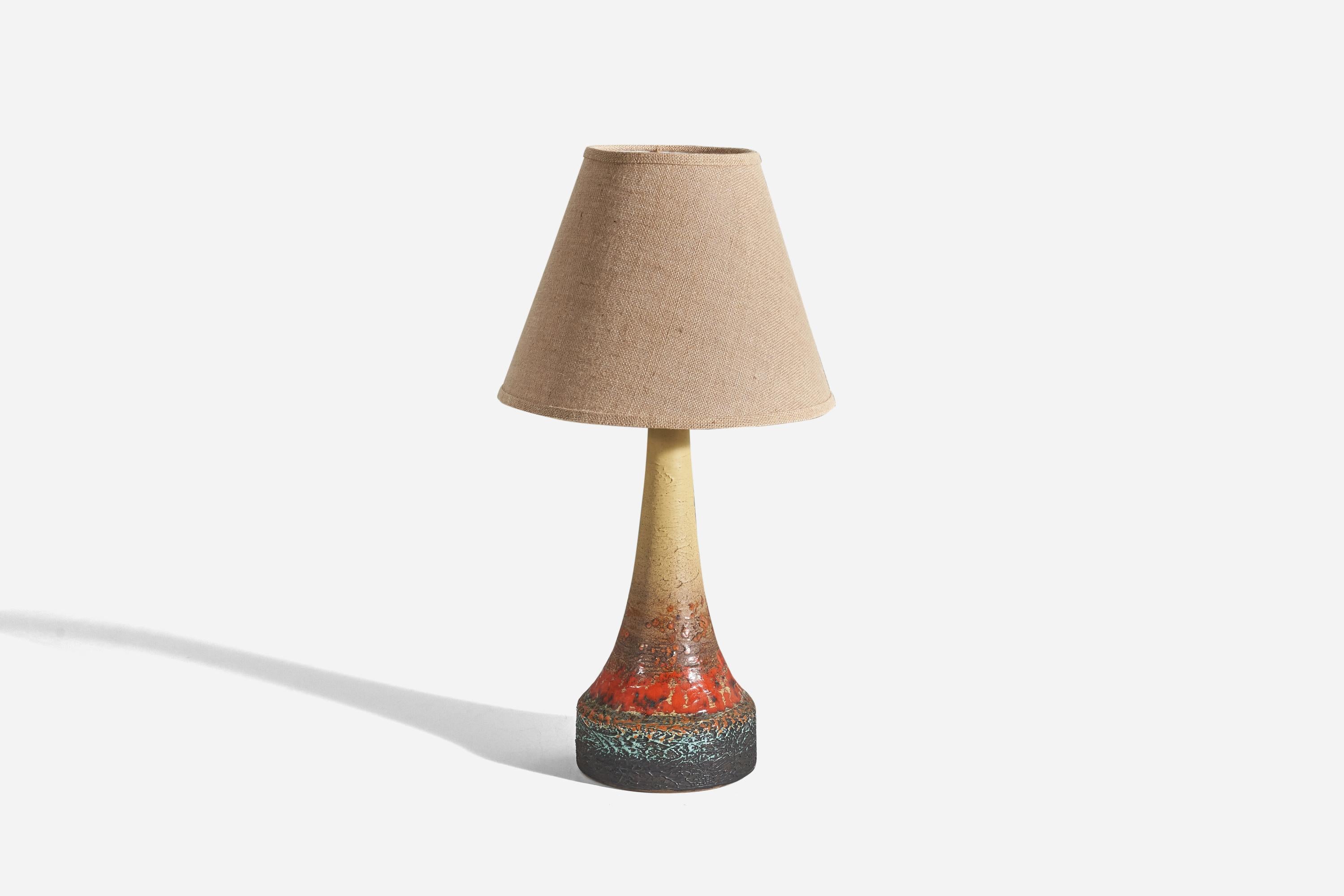 A sizeable glazed stoneware table lamp designed and produced by Tilgmans Keramik, Sweden, 1960s. 

Sold without lampshade. 
Dimensions of lamp (inches) : 19.62 x 7.75 x 7.75 (Height x Width x Depth)
Dimensions of shade (inches) : 7 x 14 x 11