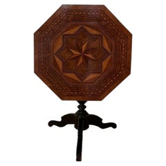 Tilt top octagonal table