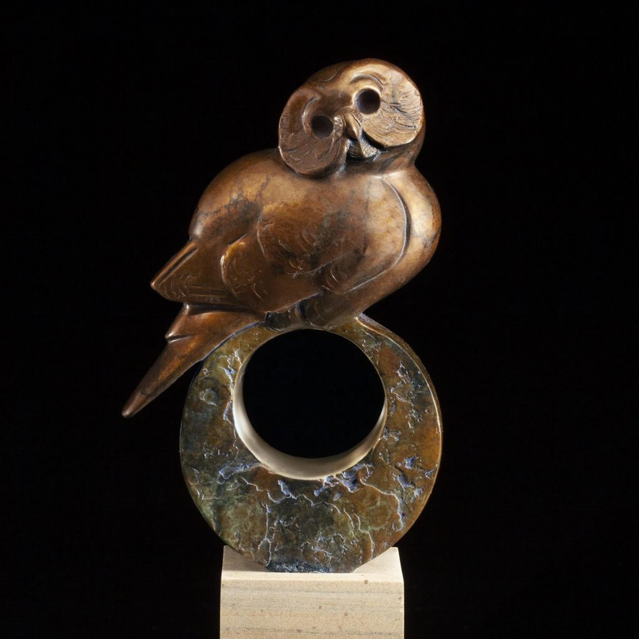 Etched signature by the Artist on the bronze base of the piece with an edition number. 
AP/18
