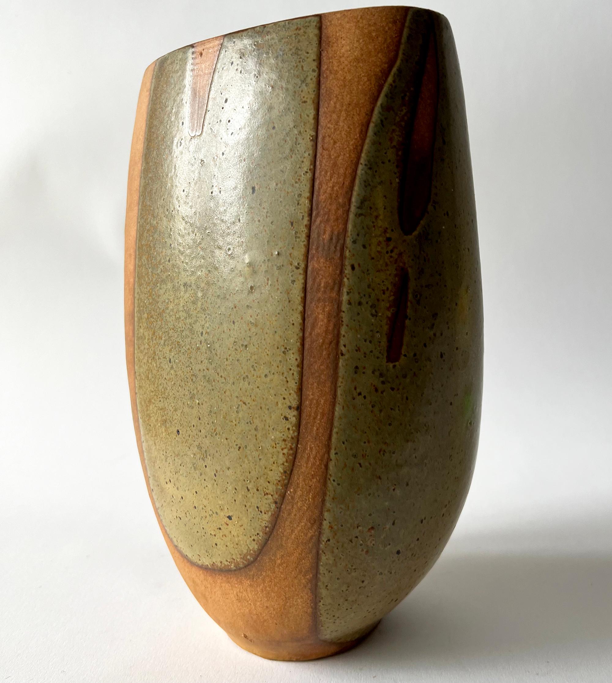 California studio pottery vase created by Tom McMillin. Vase measures 9.75
