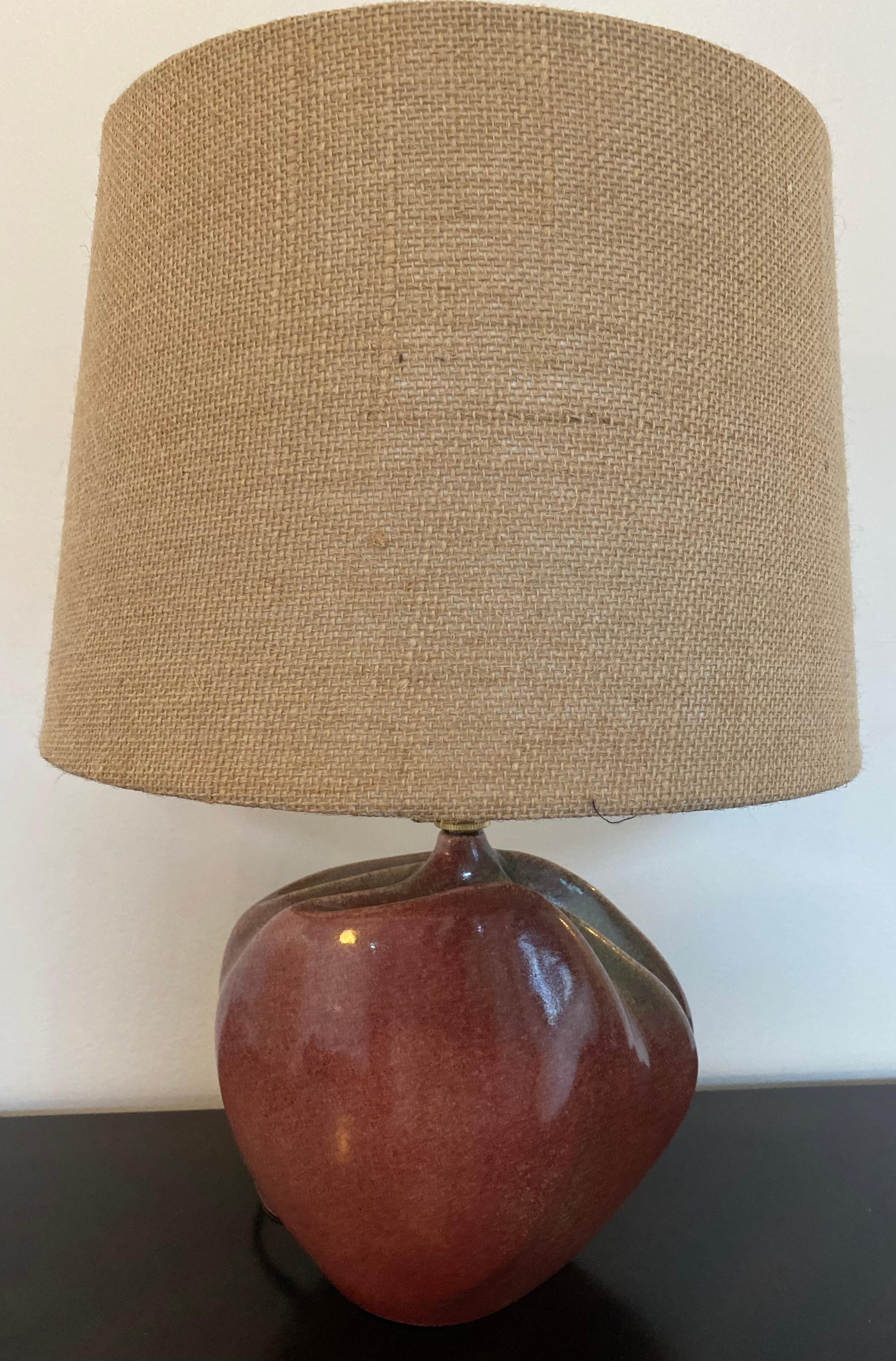 An excellent French mid century sculptural art pottery table lamp by Tim Orr.
Signed. The vase measures 8.5” H x 8.5” W x 4” D. 
Biography:
orn in England, Tim Orr is a sculptor, painter and ceramist. He moved to Biot, France in 1960 and lived