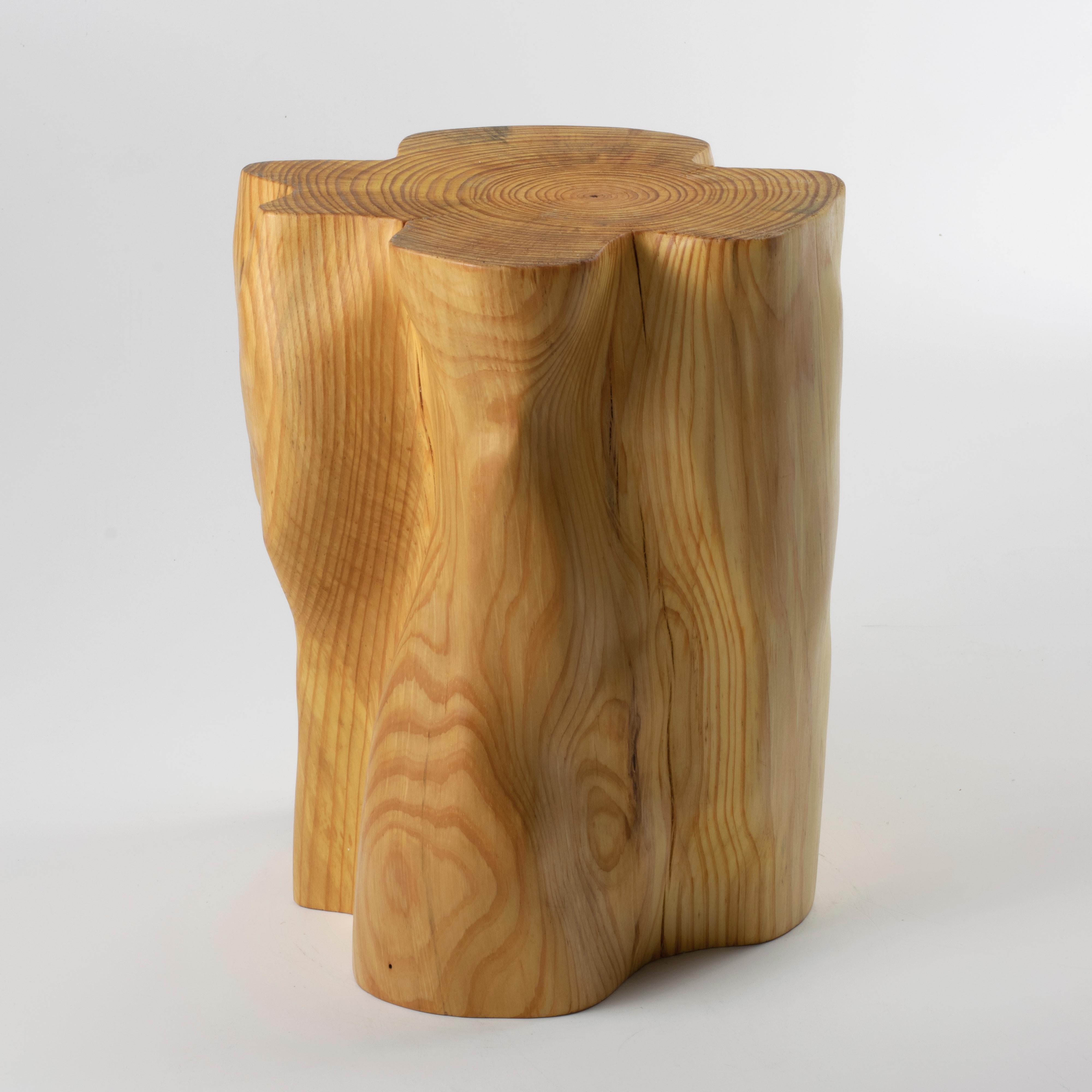 These wooden stools are digitally fabricated by artist Ezra Ardolino at Timbur LLC. 

The process consists of pine bark displacement data mapped to a cylindrical form; one, two and four times enlargement. Robotically machined in Pine timber. Oil