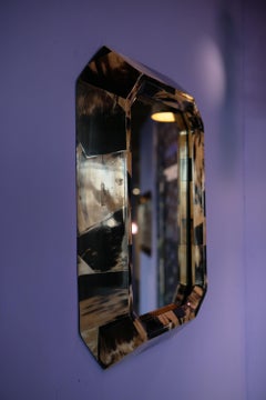 Time Further Mirror in Black Horn by Andrea Vargas Dieppa