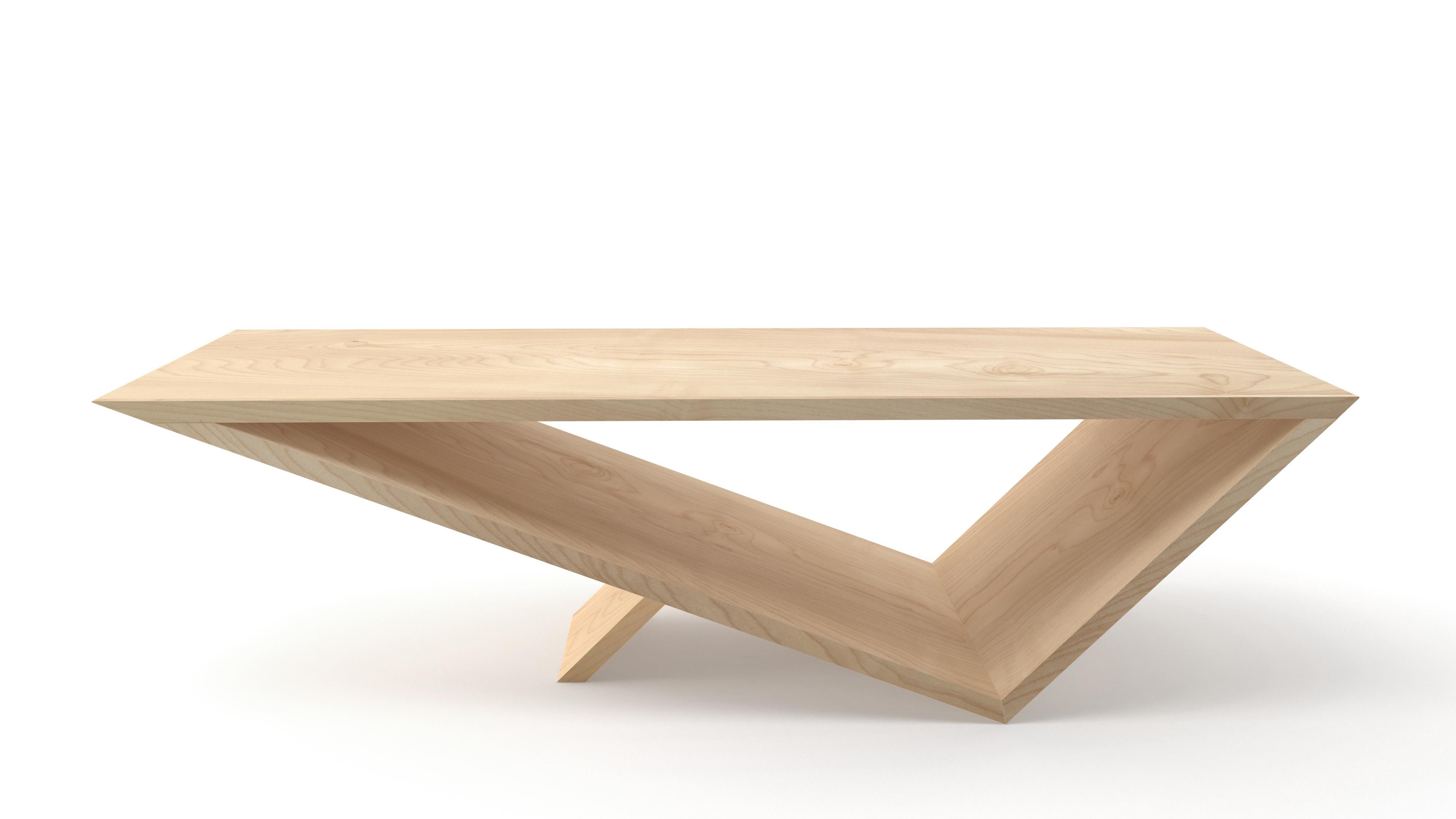 Time/space portal coffee table in maple by Neal Aronowitz Design
Dimensions: D 167.7 x W 63.5 x H 45.7 cm
Materials: Maple.
This table can also be made in other hardwoods.

The inspiration for the Time/Space Portal Table collection comes from