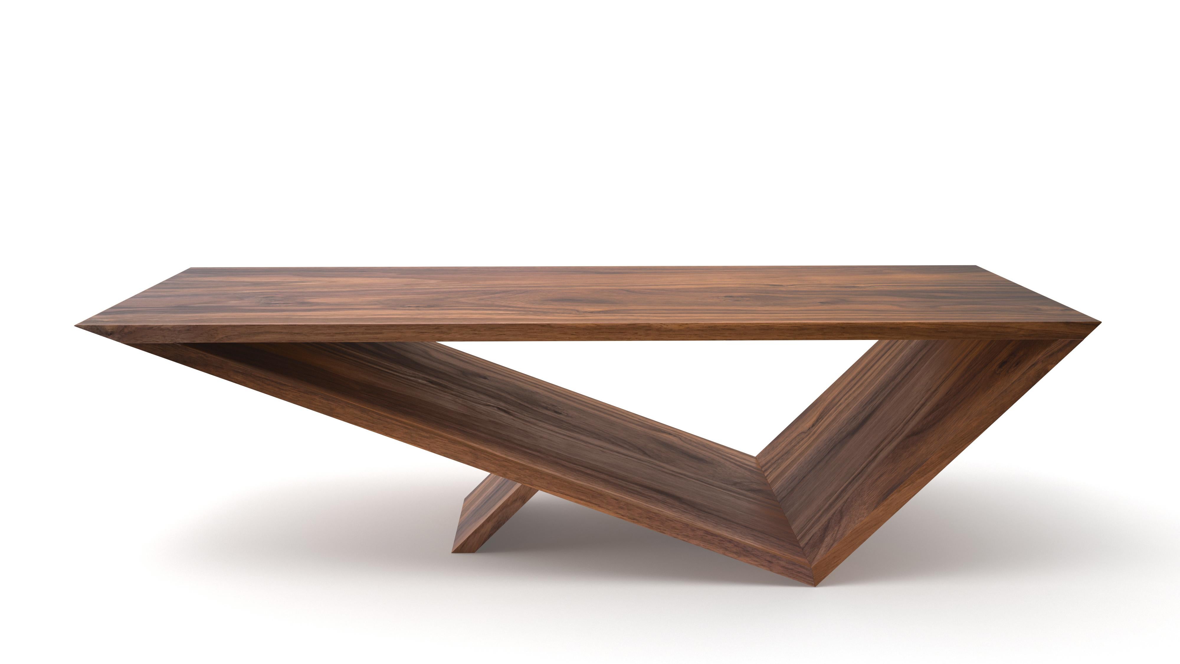 Time/Space Portal Table in solid walnut hardwood.

The inspiration for the Time/Space Portal Table collection comes from the power, simplicity, and elegance of the triangle.
This is an ongoing series exploring the dynamics of balance, weight,