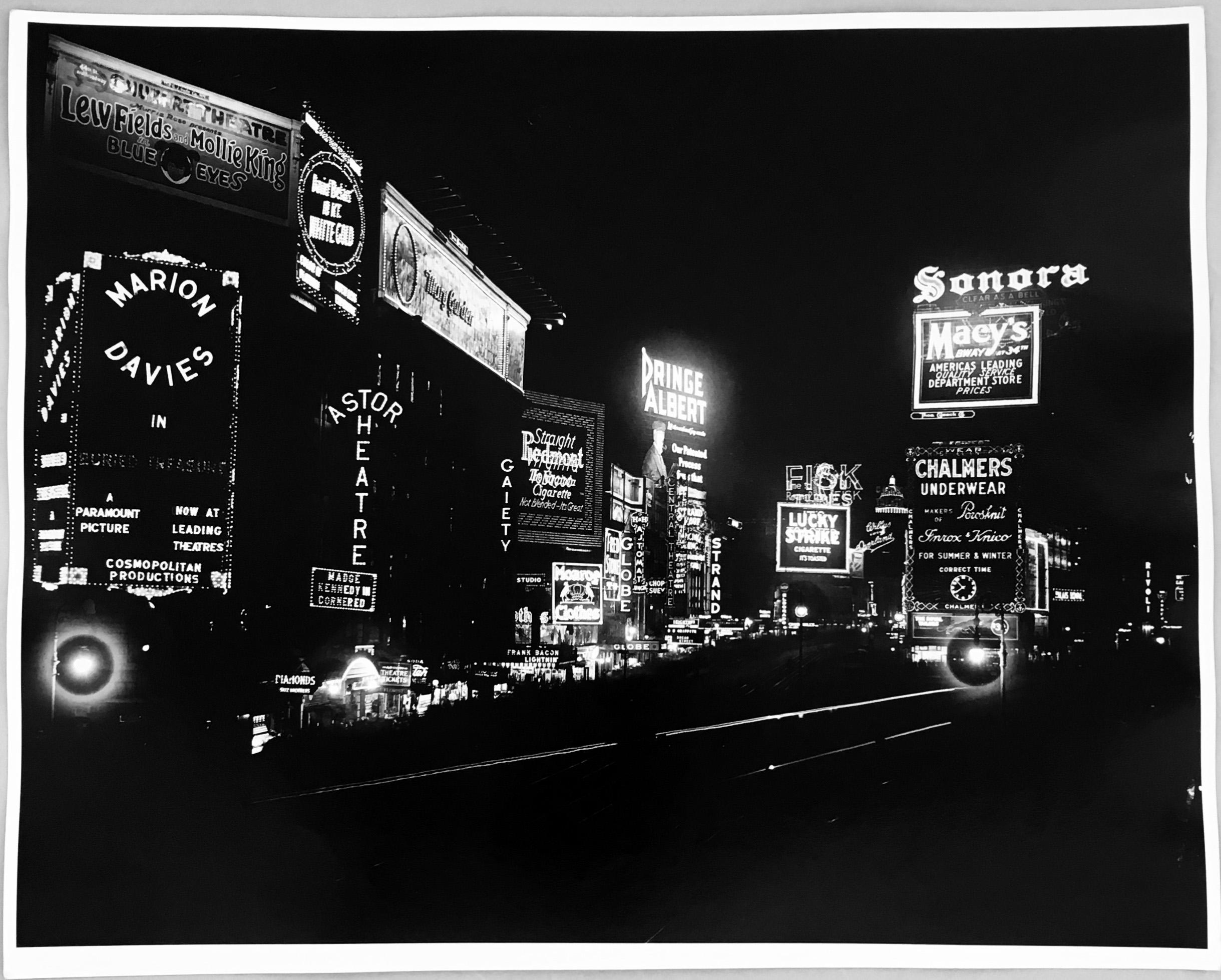 Manhattan's Time Square at night photographed, circa mid-1930s

Vintage original gelatin silver print, printed circa late-1950s
Dimensions: 16 x 20 inches 
Unsigned from unknown photographer
Very good condition with the exception of some mild