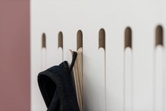 "Time" the Motion Coat Hanger