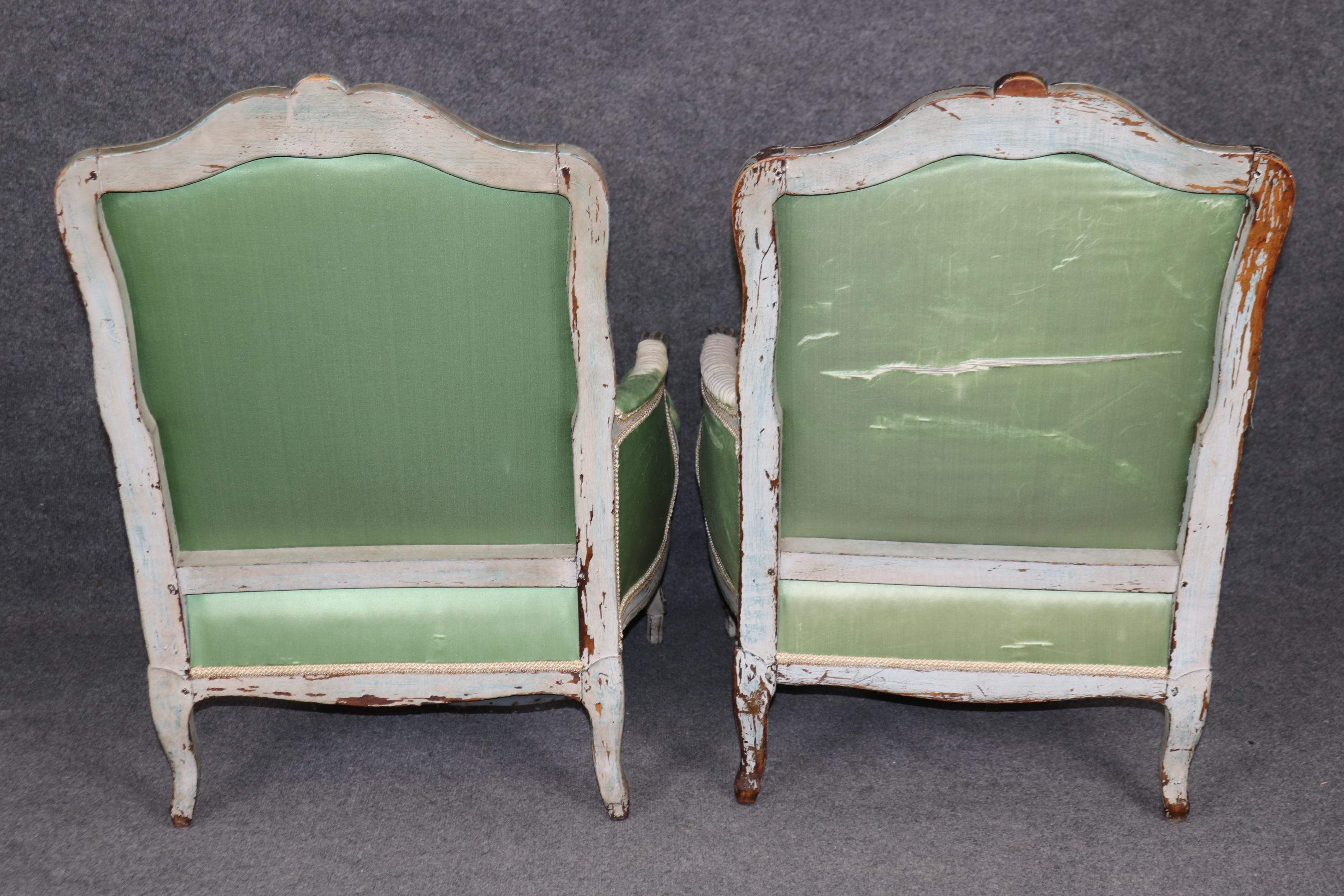 Time-worn Antique French Louis 18th century Carved Walnut Bergere Chairs For Sale 1