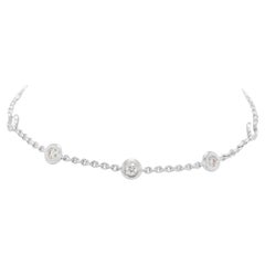 Brazalete intemporal con estación de diamantes naturales de 0,21 ct en oro blanco de 18 quilates