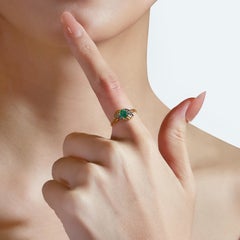 Timeless 0.50ct Oval Green Emerald and Diamonds Ring in 18K Yellow Gold