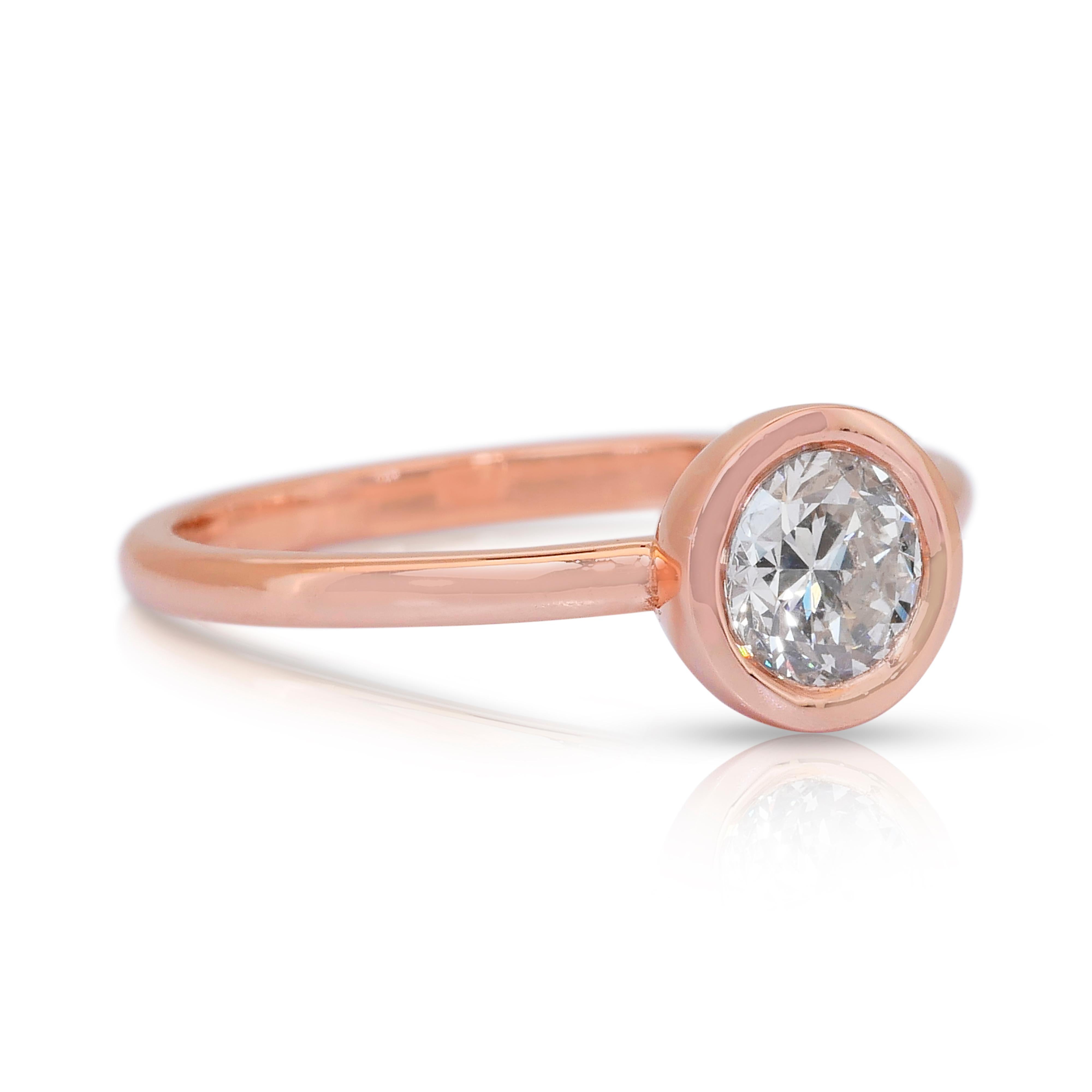 Anello solitario senza tempo con diamante da 0,60 carati in oro rosa 18k - Certificato IGI

Questo anello solitario in oro rosa 18 carati mette in mostra un affascinante diamante rotondo da 0,60 carati. Con un colore e una chiarezza tenui, la pietra