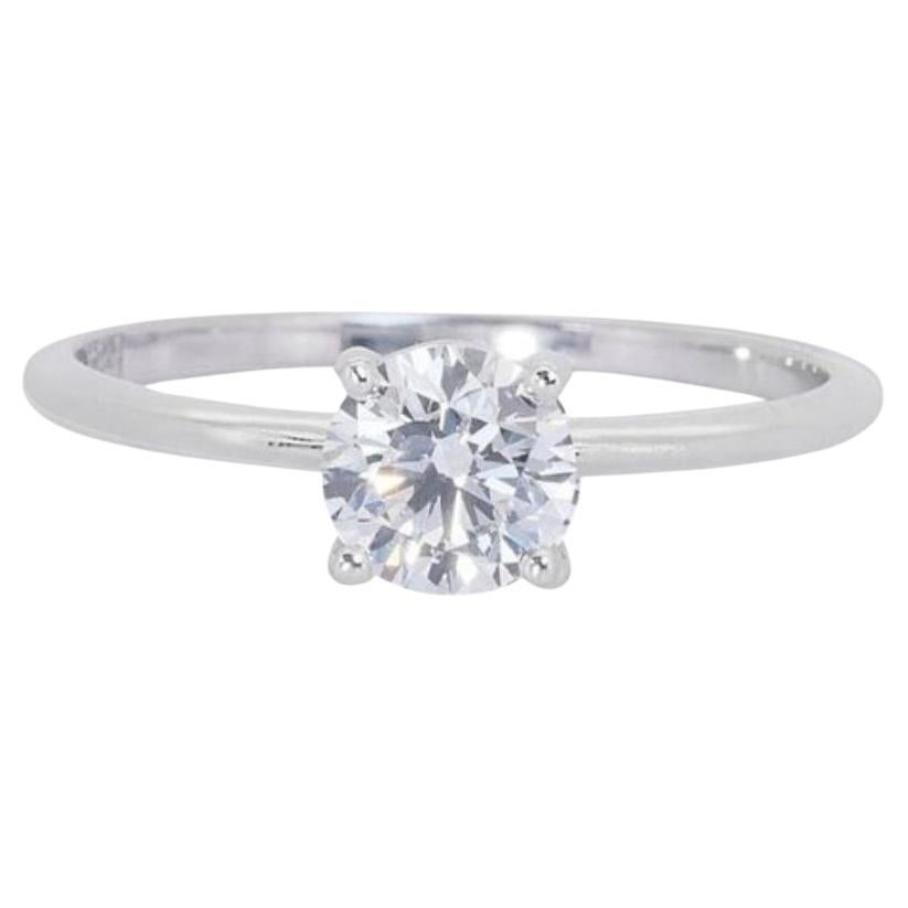 Timeless 0.70 Carat Round Brilliant Diamond Ring in 18K White Gold For Sale