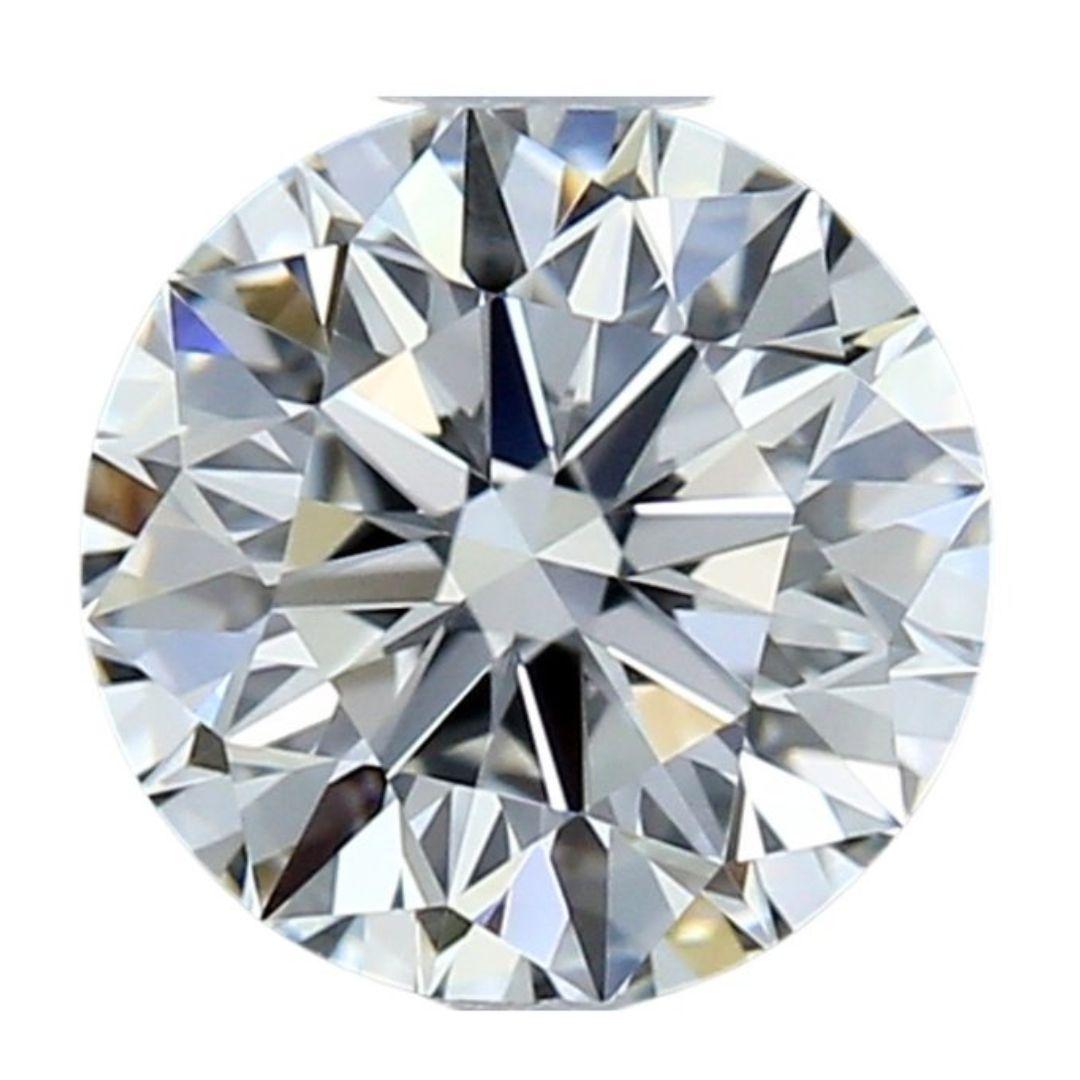 Diamante rotondo senza tempo con taglio ideale triplo eccellente da 0,70 carati - Certificato IGI in vendita 4
