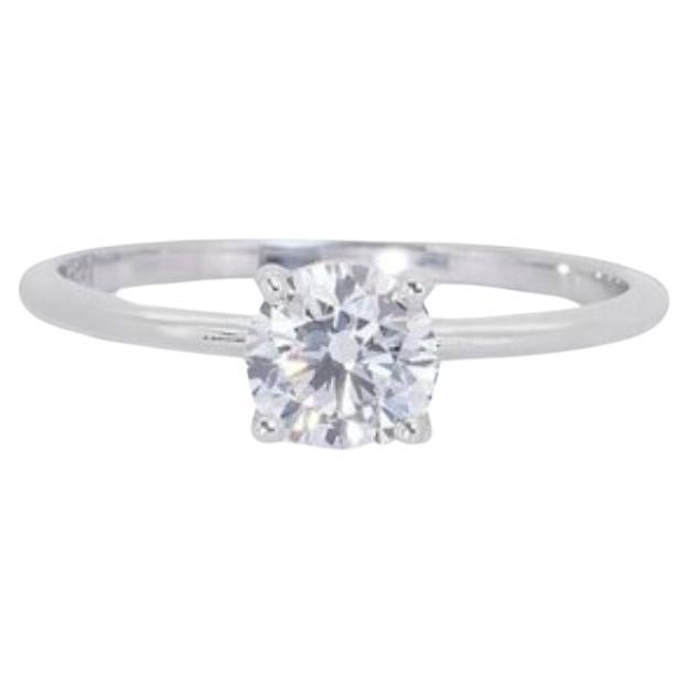 Timeless 0.71 carat Round Brilliant Diamond Ring in 18K White Gold For Sale