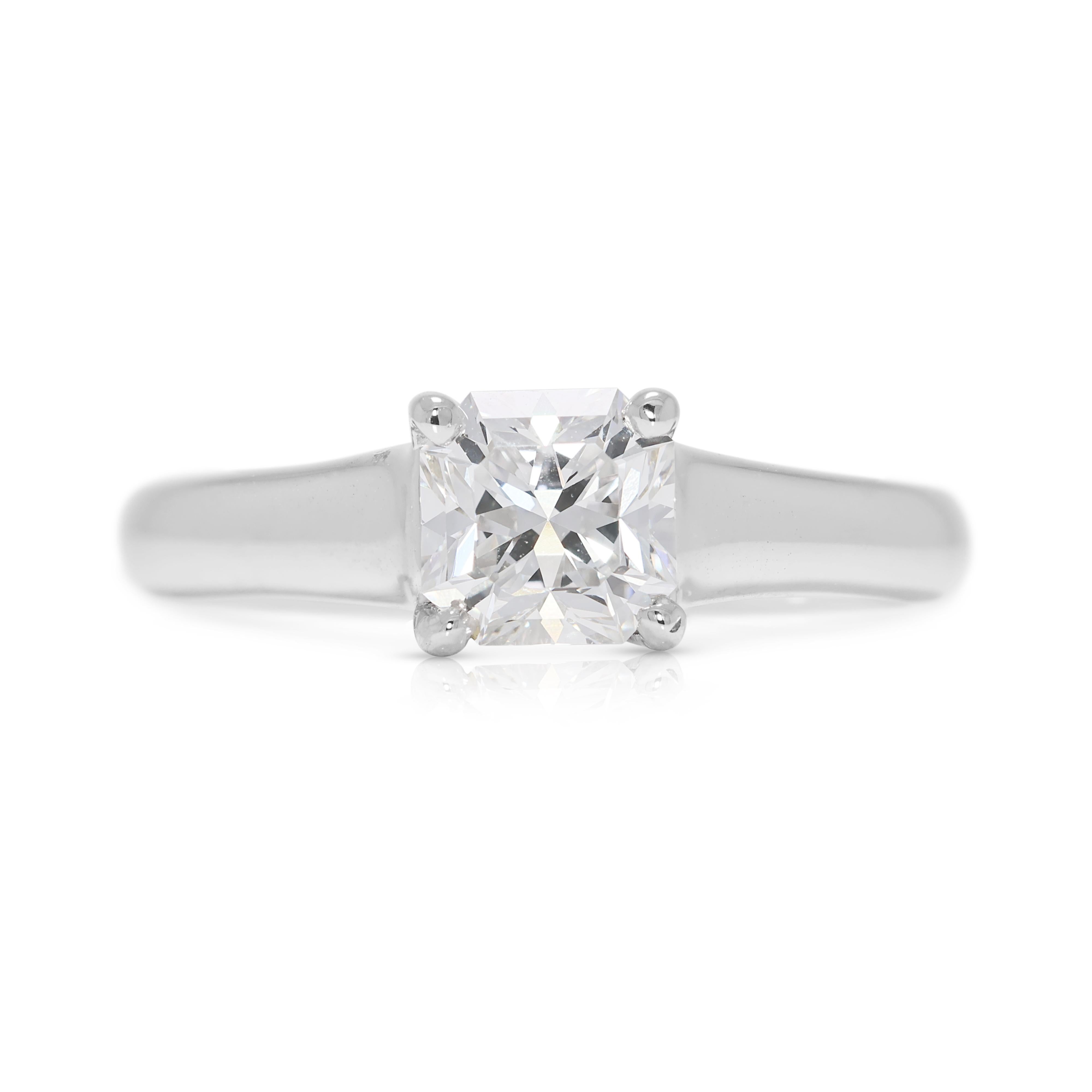 Bague solitaire en platine avec diamant naturel de 0,74 ct.