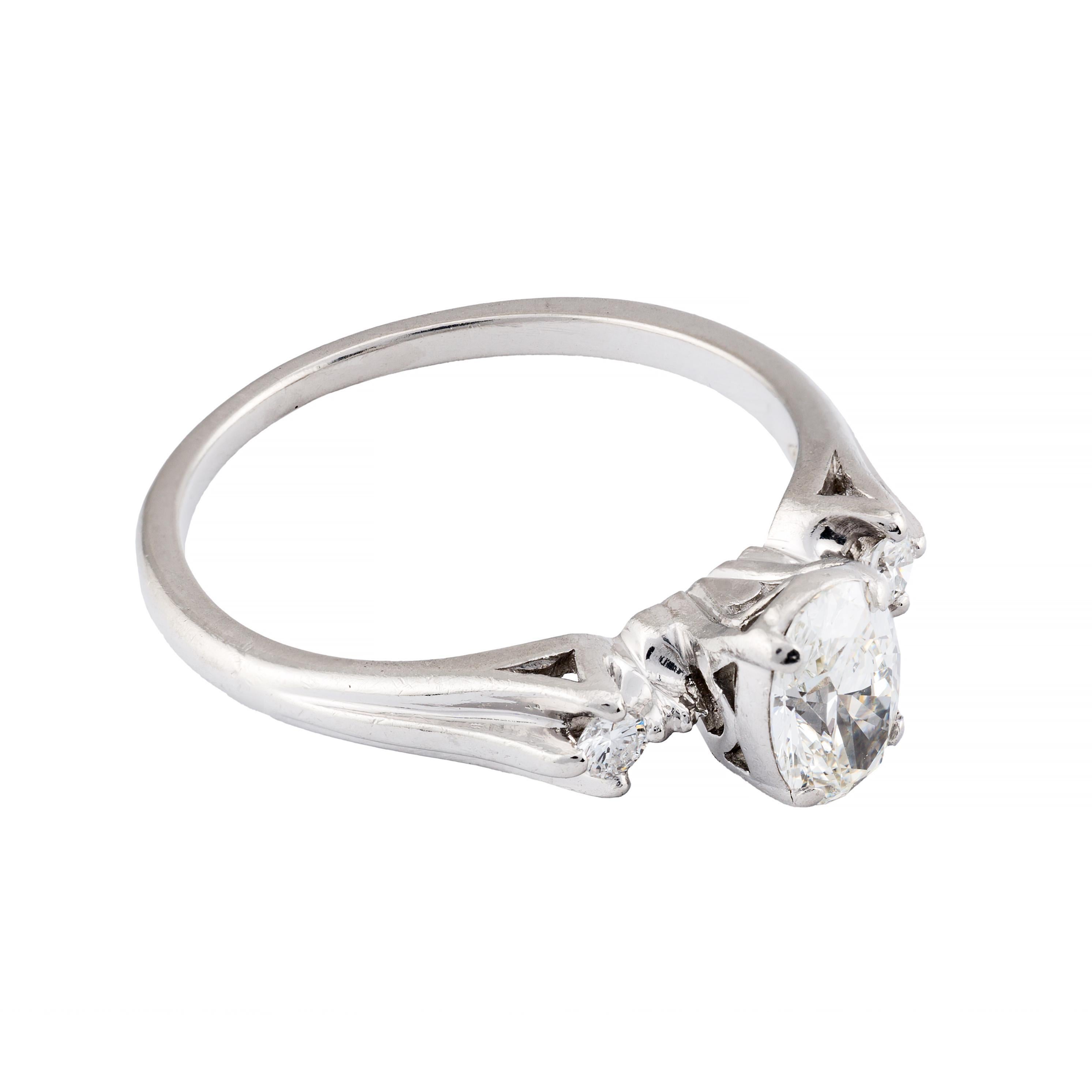 Timeless 0.80Ct Oval Cut Diamond Three Stone Engagement Ring in Platinum In Excellent Condition For Sale In Boston, MA