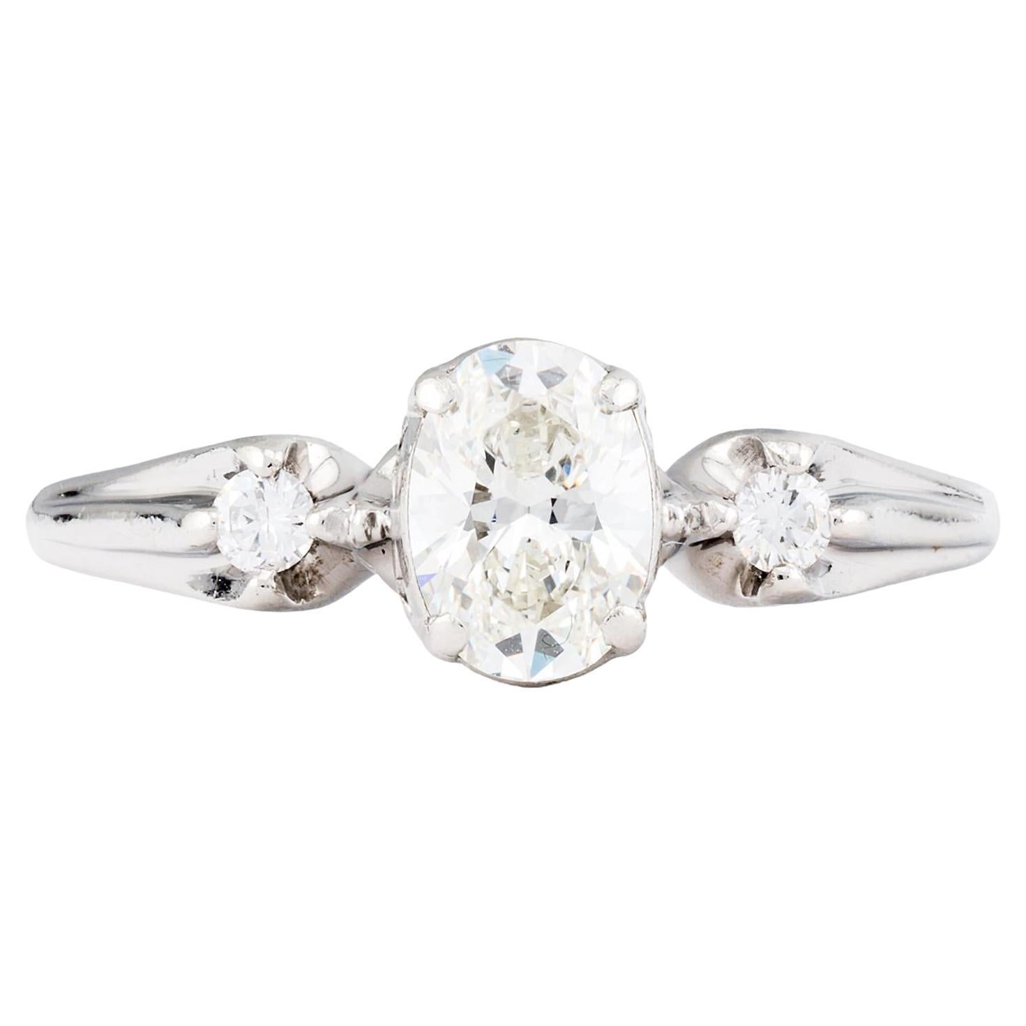 Timeless 0.80Ct Oval Cut Diamond Three Stone Engagement Ring in Platinum