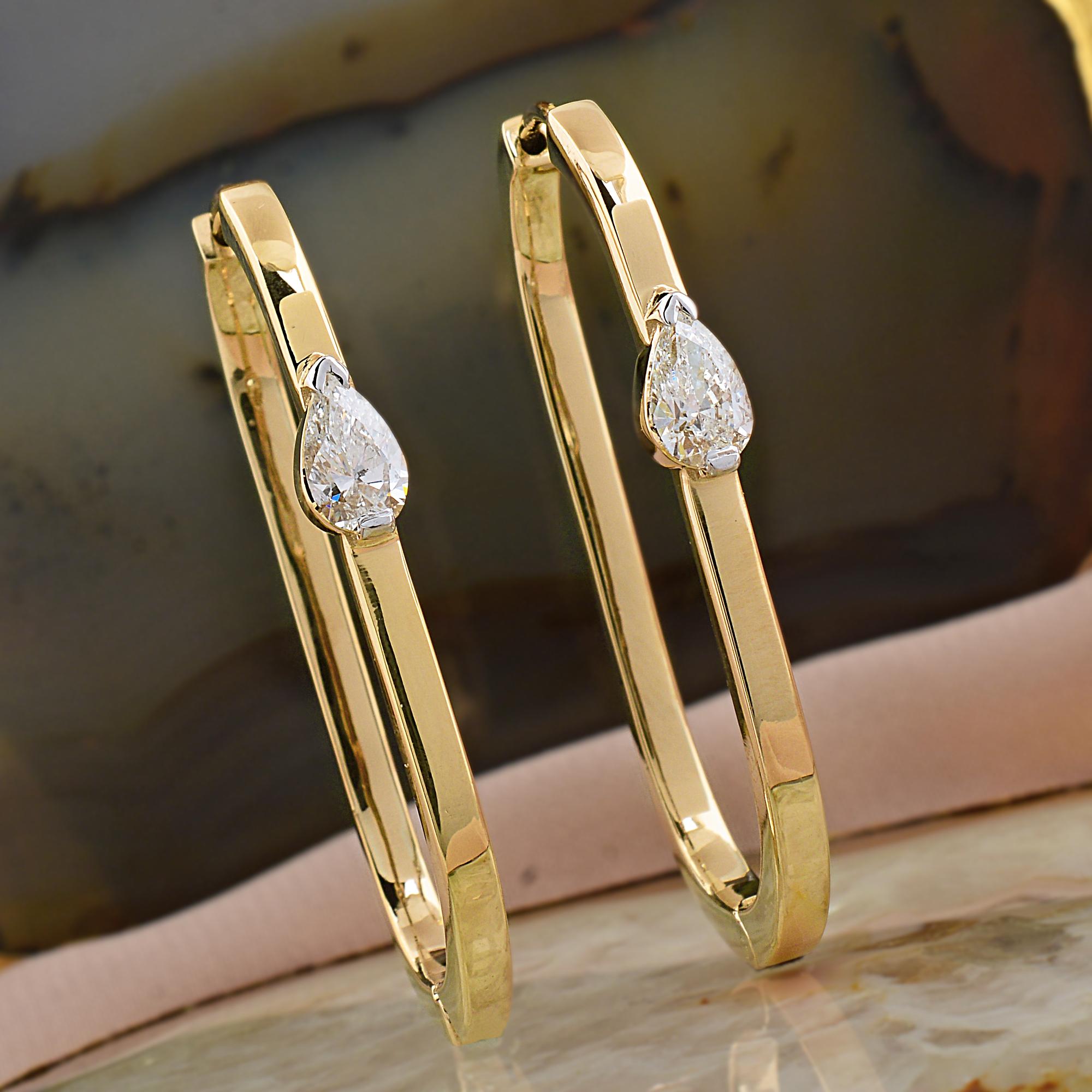 Timeless 0.82 Carat Pear Cut Diamond Minimalist Hoop Earrings 18k Yellow Gold Crafted in a smooth, high-polish 18K gold, these slim hoops embrace a clean, geometric design with a beautiful teardrop-shaped diamond placed at the center for subtle