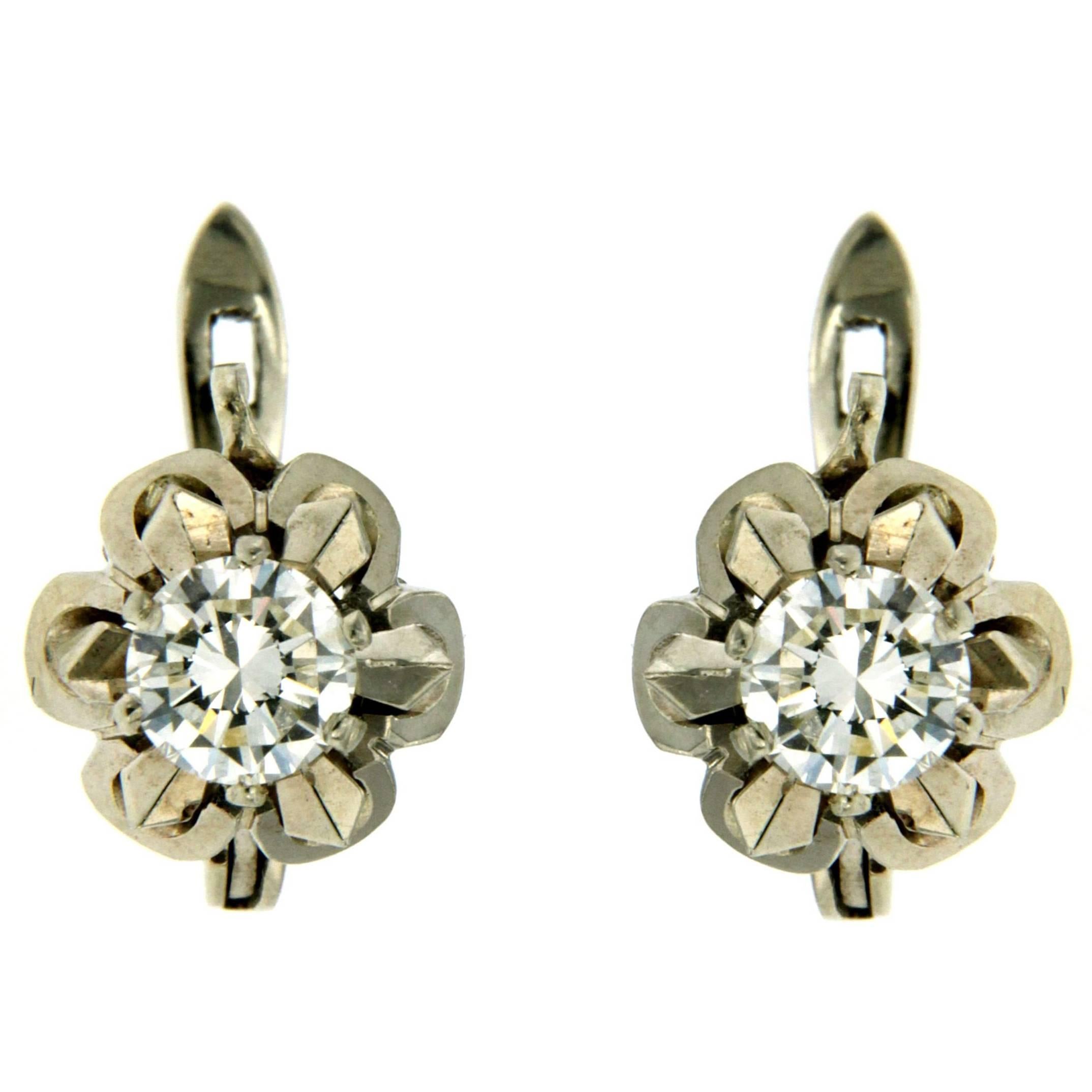 Timeless 1 carat Diamonds Gold Solitaire Stud Earrings