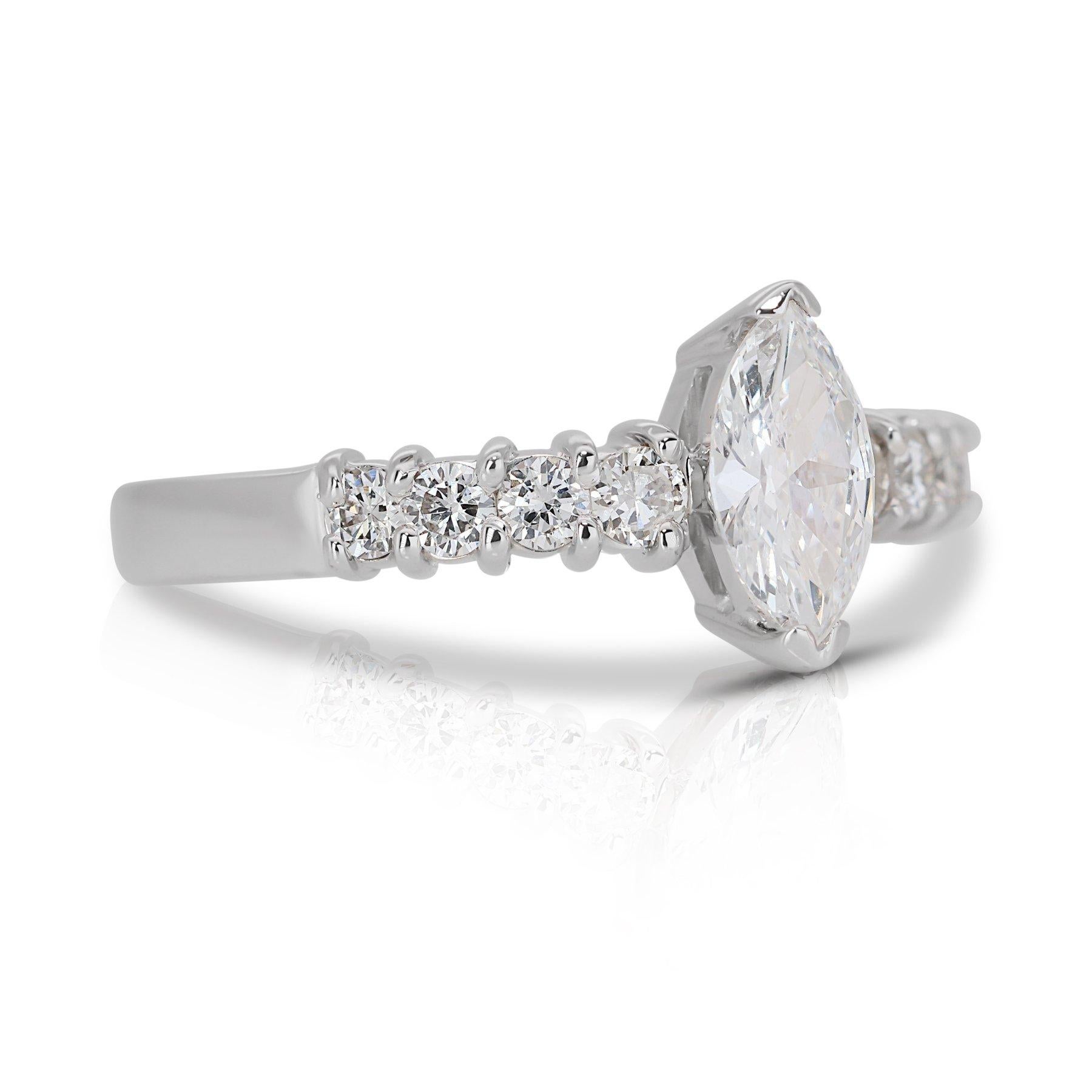 Timeless 1.08ct Diamonds Pave Ring in 18k White Gold - GIA Certified

Experience timeless grace with this stunning 18k white gold pave ring, featuring a captivating 0.70-carat marquise diamond. Enhanced by 8 round side diamonds totaling 0.38 carats,