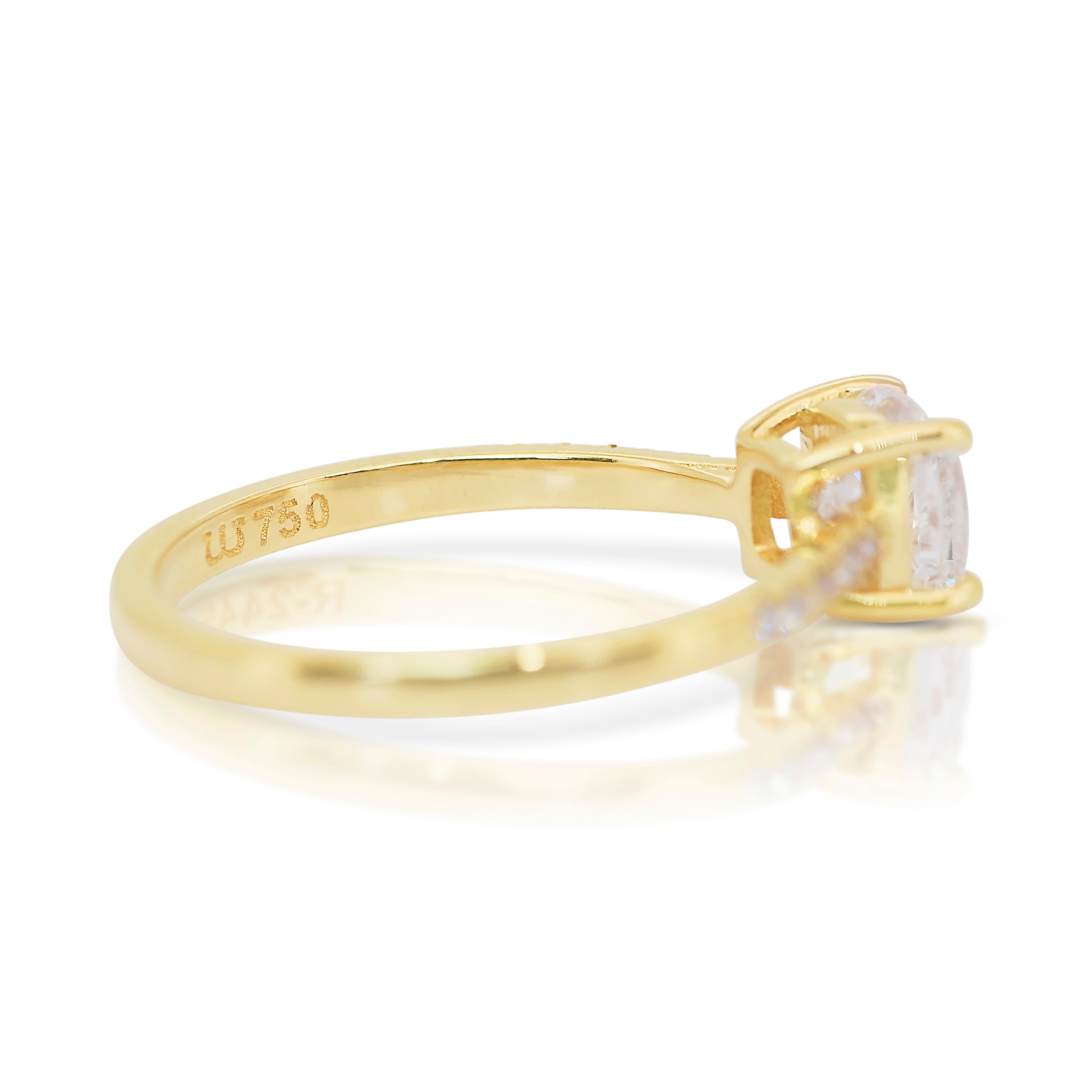 Timeless 1.12ct Diamonds Pave Ring in 18k Yellow Gold - IGI Certified

Add a touch of timeless charm with this stunning pavé diamond ring, crafted in radiant 18k yellow gold. The centerpiece is a 1.01ct cushion-shaped diamond radiating classic