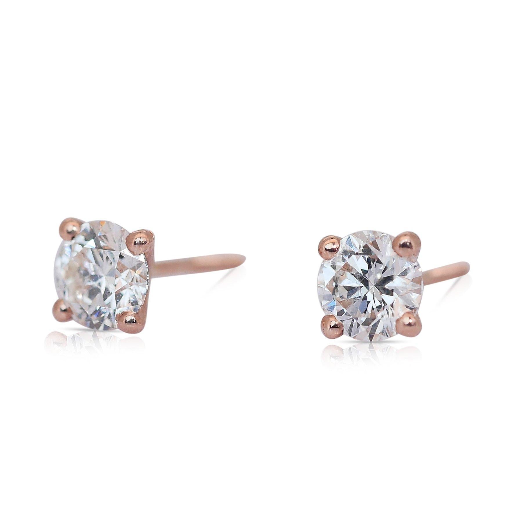 Timeless 1.41ct Triple Excellent Ideal Cut Diamonds Stud Earrings in 18k Rose Gold - GIA Certified

Add a touch of modern elegance with these stunning 18k rose gold diamond earrings, featuring two brilliant round diamonds with a total carat weight