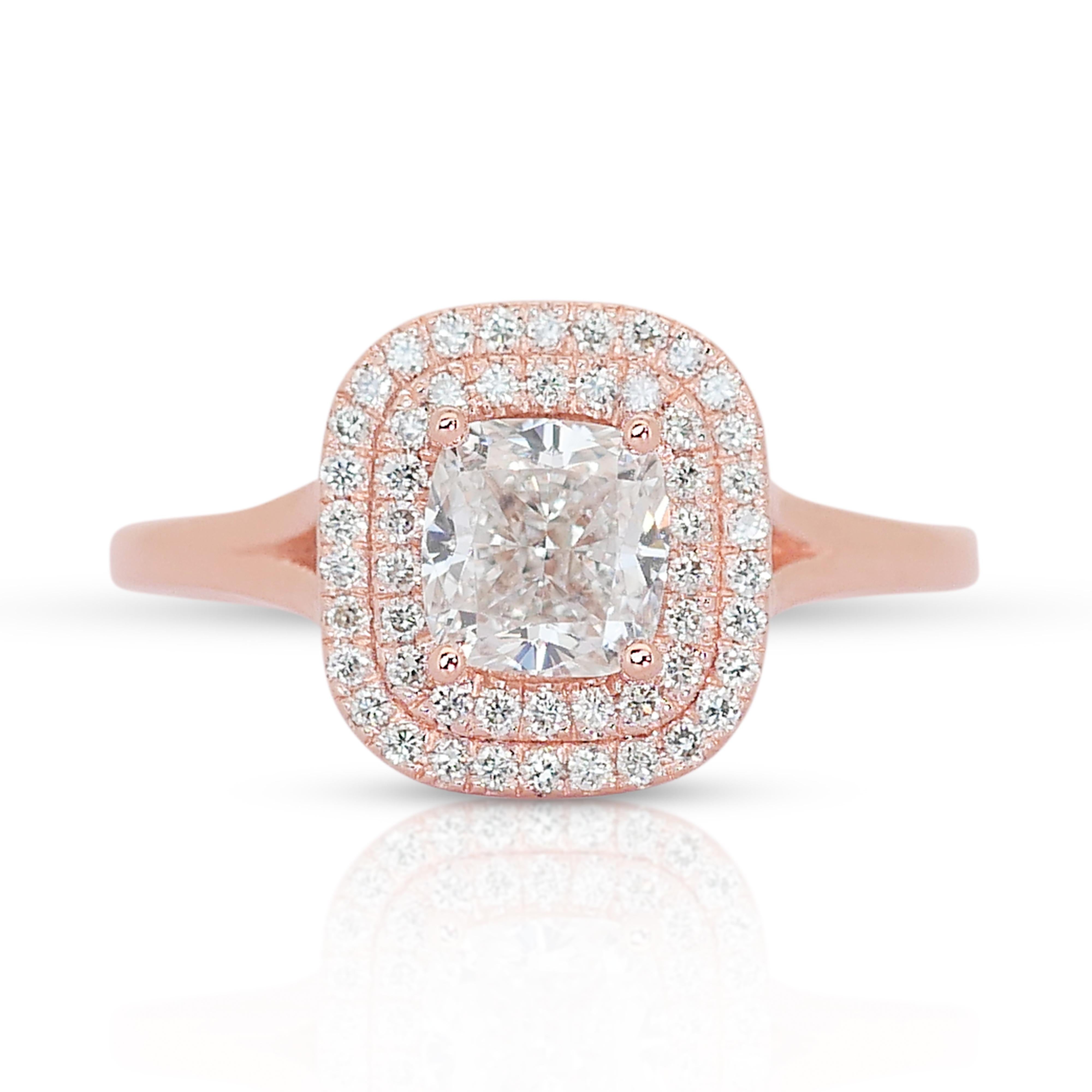 Timeless 14k Rose Gold Diamond Double Halo Ring w/1.23 ct - IGI Certified

Embrace timeless elegance with this exquisite 14k rose gold double halo ring, featuring a stunning 1.00 carat square cushion diamond as its centerpiece. Encircling the