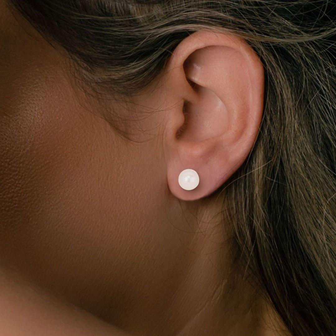 Introducing the Timeless 14K White Gold Pearl Stud Earrings, a stunning embodiment of enduring elegance and refined simplicity. These elegant stud earrings showcase two pearls, each with a dimension of 5.91mm, offering a classic and sophisticated