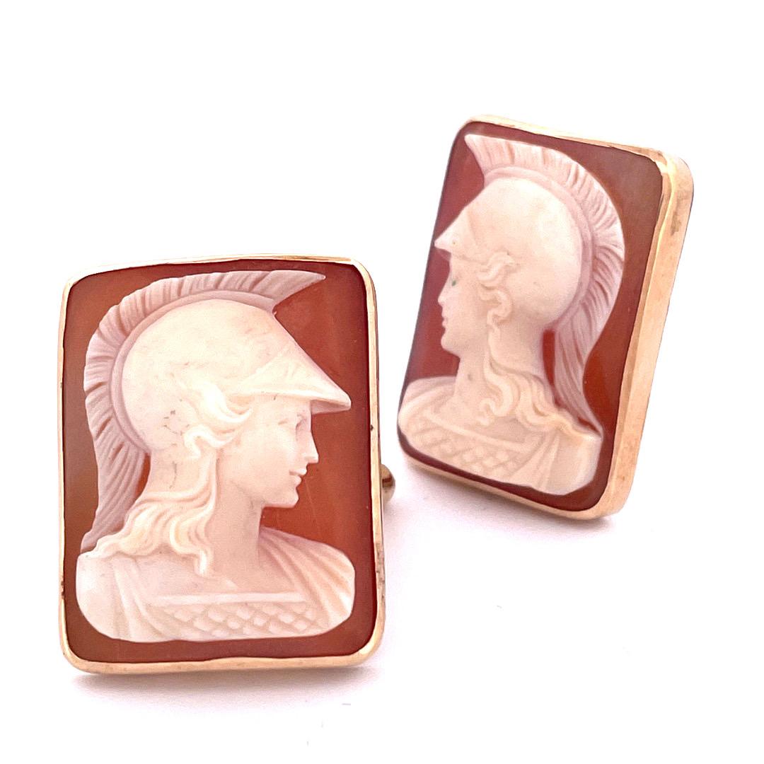 Step into history with our captivating 14k yellow gold Victorian soldier cameo cufflinks. These remarkable accessories feature exquisitely carved cameos depicting the distinguished faces of Victorian soldiers, adding a touch of vintage allure to