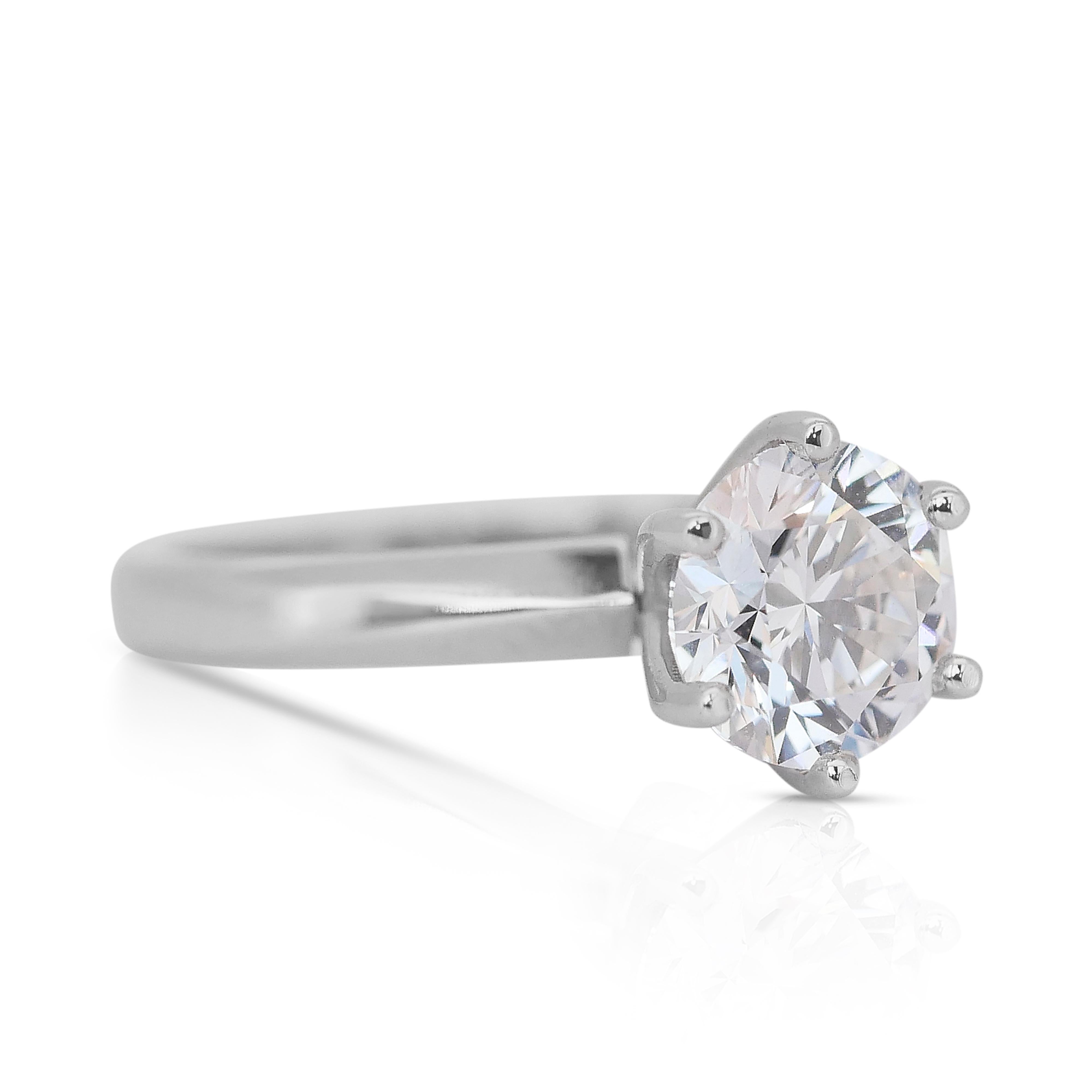 Timeless 2.20ct Triple Excellent Ideal Cut Diamond Solitaire Ring in 14k White Gold - GIA Certified

A timeless symbol of love and commitment, this exquisite 14k white gold solitaire ring showcases a magnificent 2.20-carat diamond, also graded as a
