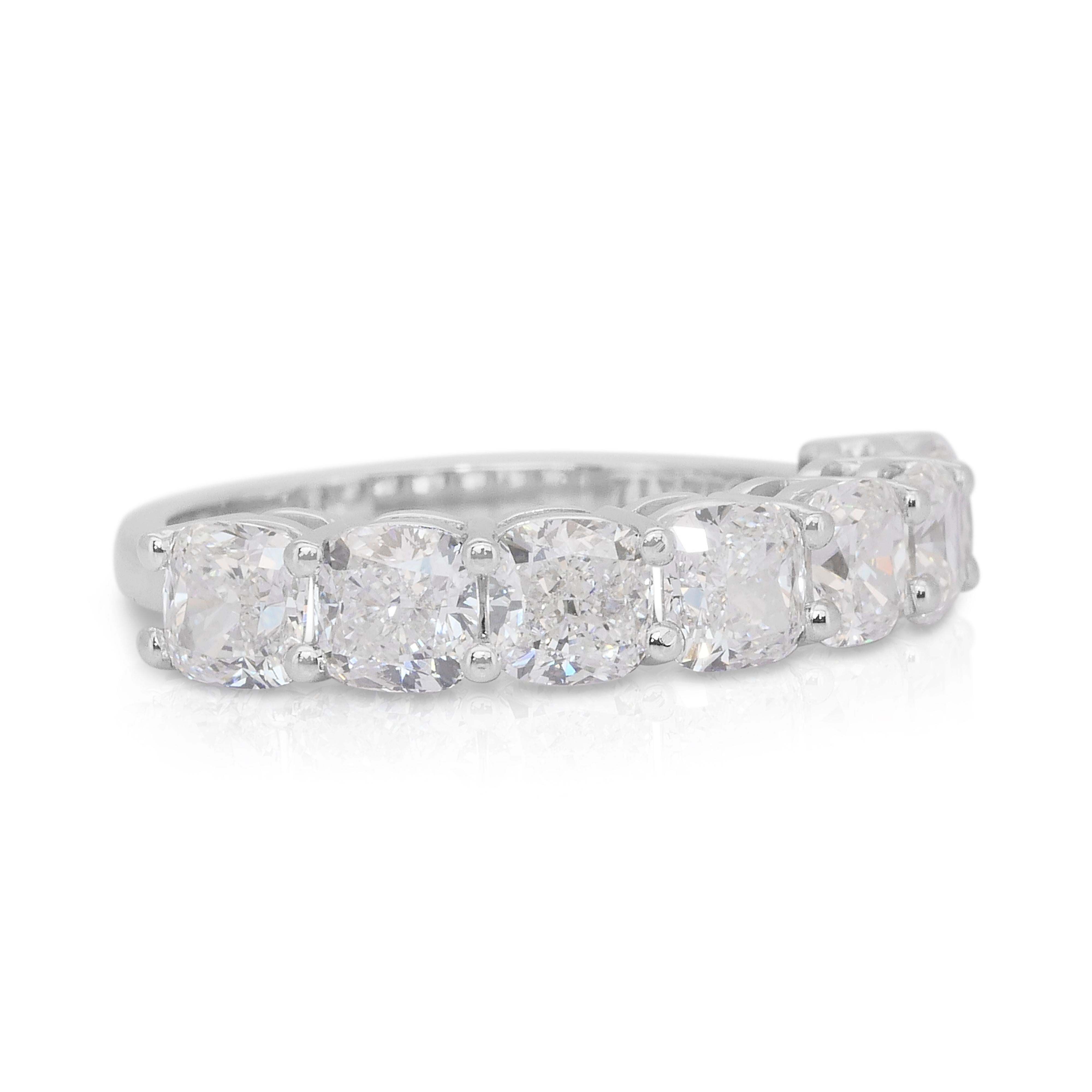 Timeless 3.17ct Diamonds 7-Stone Ring in 18k White Gold - GIA Certified

A breathtaking celebration of purity and brilliance, this 18k white gold ring features seven cushion-cut diamonds totaling an impressive 3.17ct. Each diamond is masterfully set