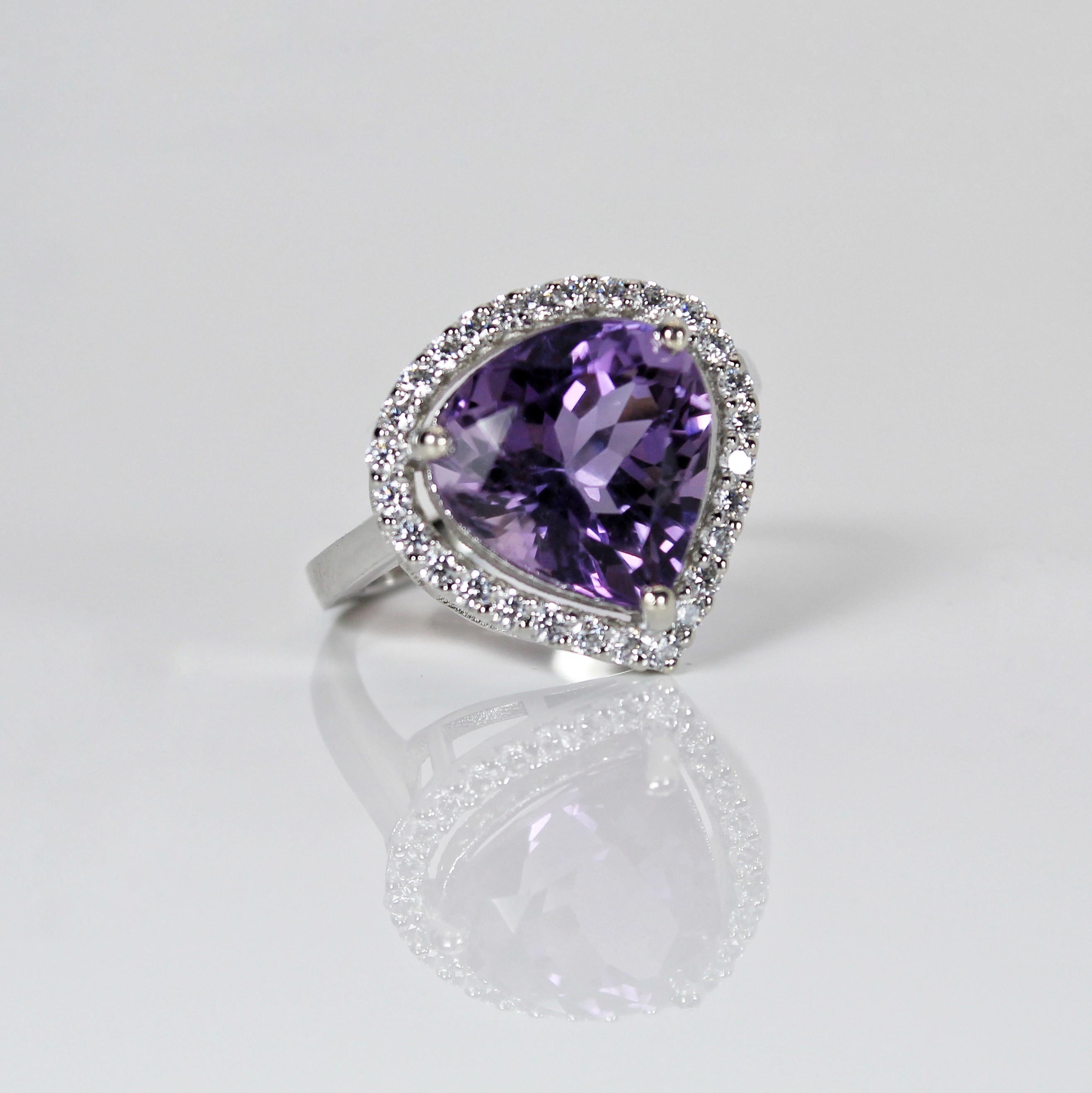Product Details:

Metal - Silver
Indian ring size - 13
Product gross Weight - 4.530 Grams
Gemstone - Natural amethyst
Stone weight - 5.35 Carat
Stone shape - Pear
Stone size - 12 x 10 mm

our natural amethyst gemstone ring in sterling silver studded